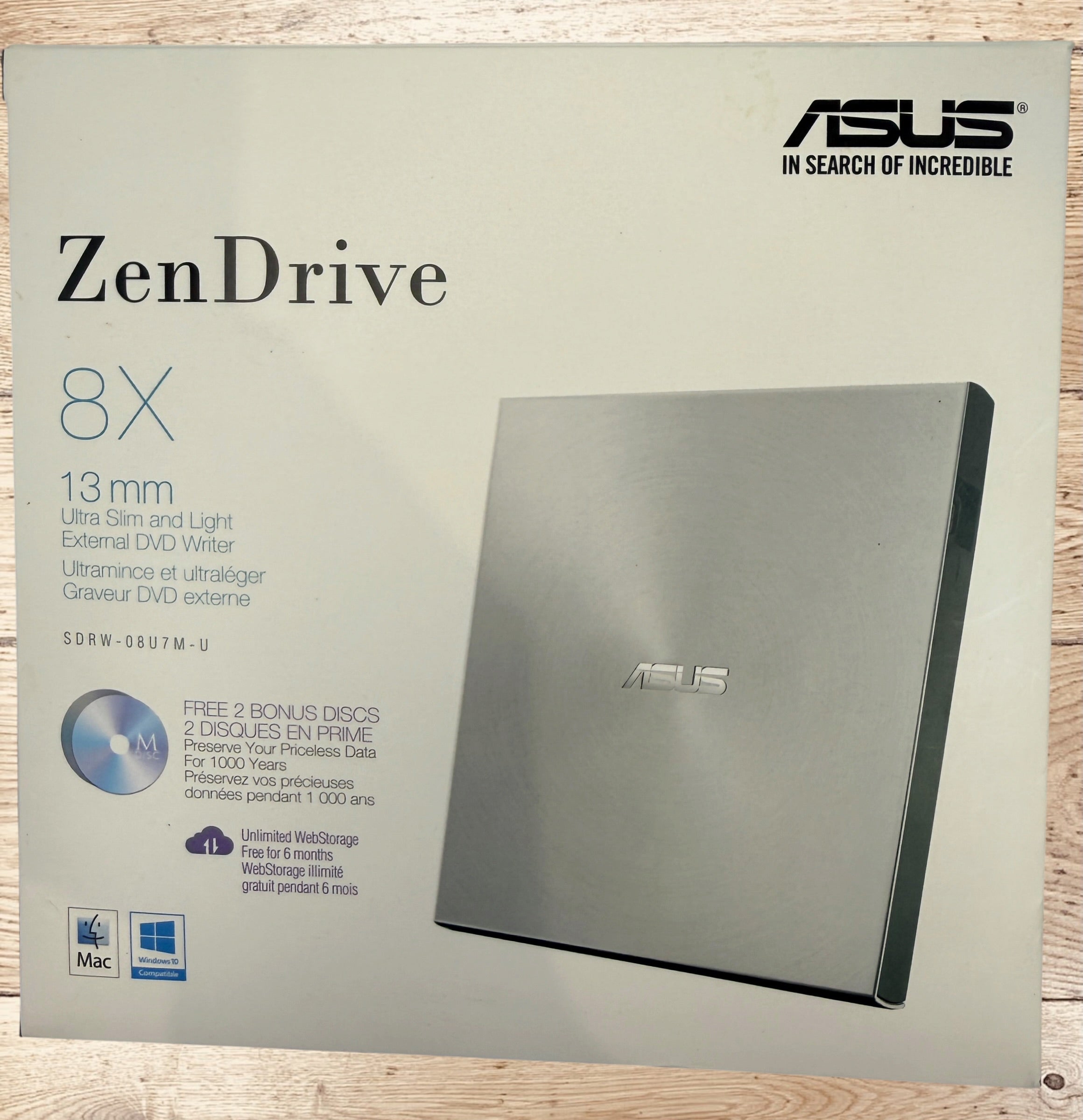 ASUS ZenDrive SDRW-08U7M-U external USB DVD writer with original box, USB cable and manuals. Ultra-slim, M-DISC compatible, tested and fully functional for Windows and Mac.