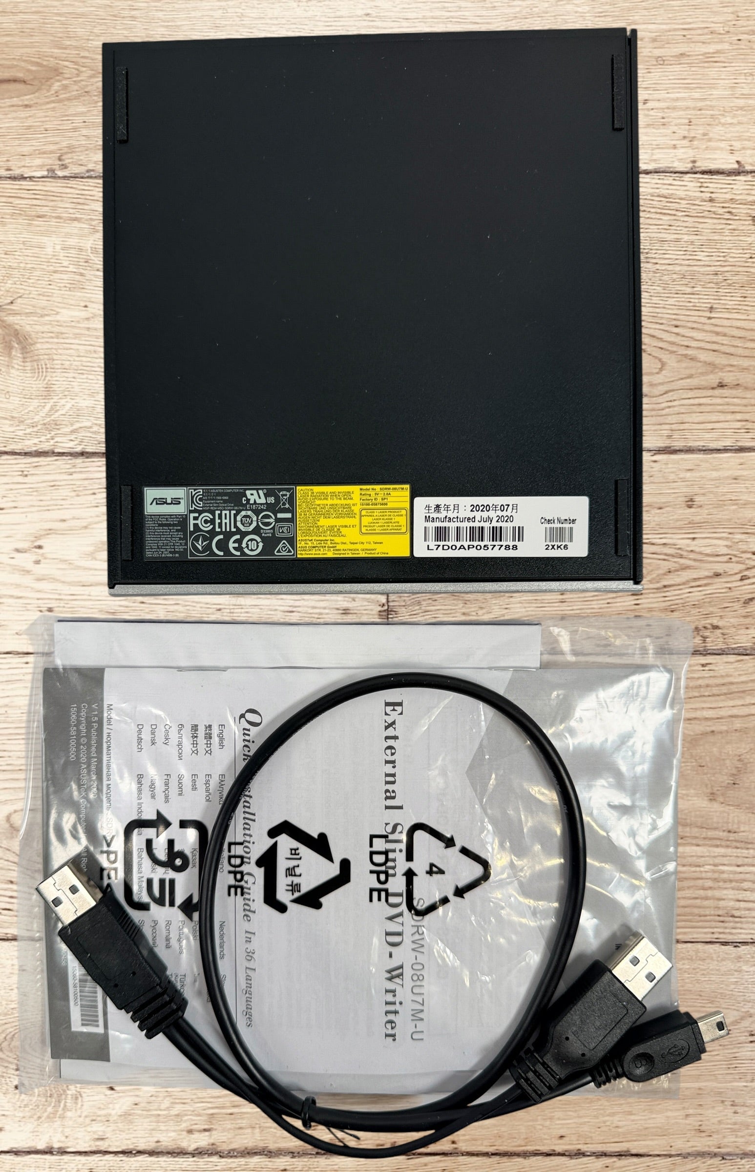 ASUS ZenDrive SDRW-08U7M-U external USB DVD writer with original box, USB cable and manuals. Ultra-slim, M-DISC compatible, tested and fully functional for Windows and Mac.