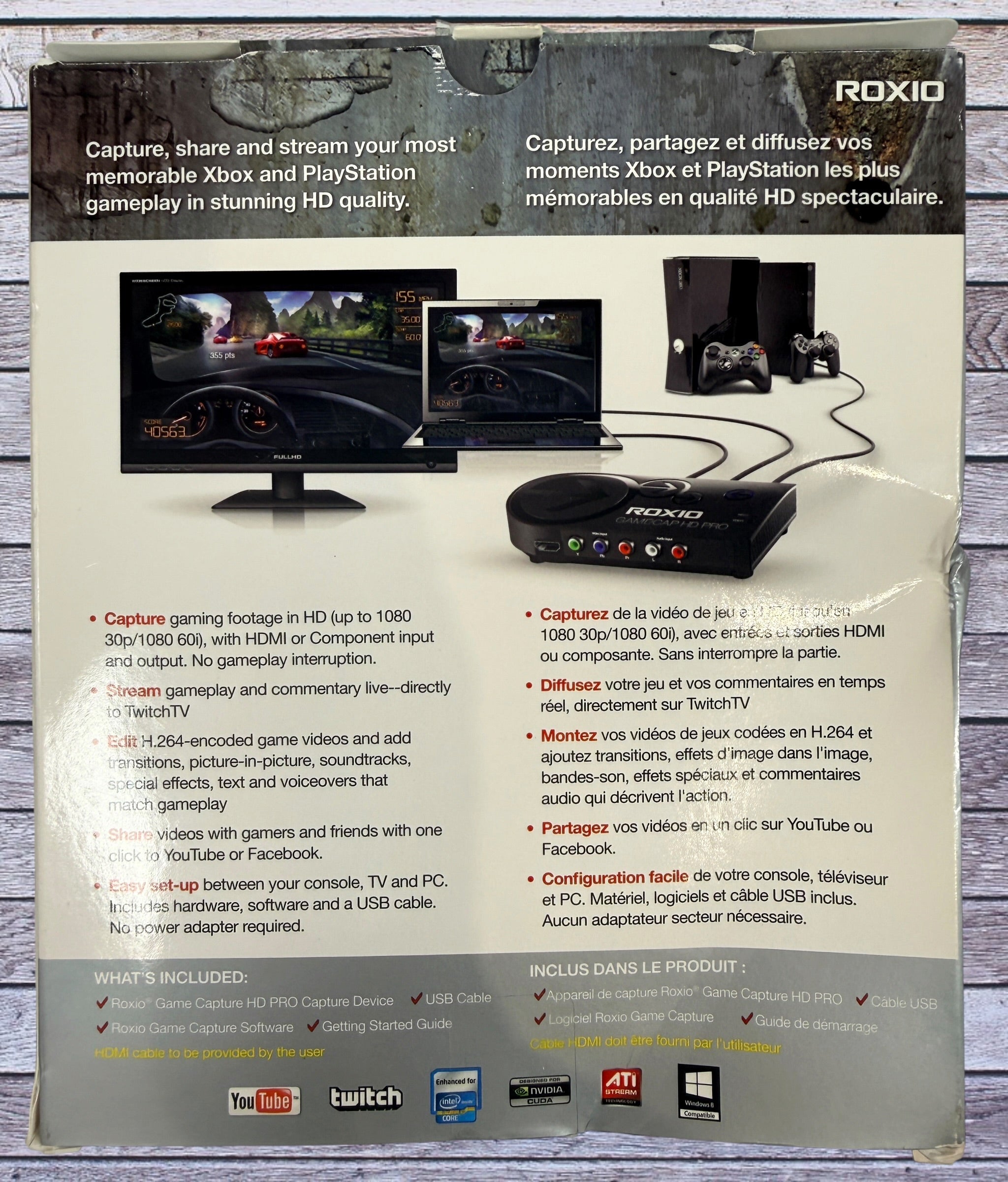 Capture Xbox and PlayStation gameplay with the Roxio Game Capture HD Pro. Includes original box, USB cable, HDMI support, and HD recording capability.