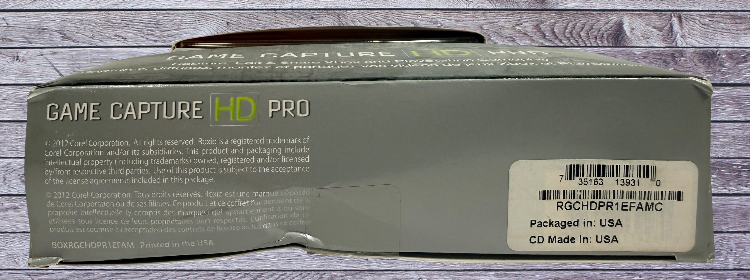 Capture Xbox and PlayStation gameplay with the Roxio Game Capture HD Pro. Includes original box, USB cable, HDMI support, and HD recording capability.