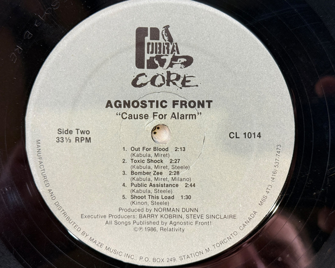 Original 1986 Canadian Agnostic Front Cause For Alarm LP on Cobra Core Records CL 1014. Tested vintage hardcore punk vinyl with original jacket