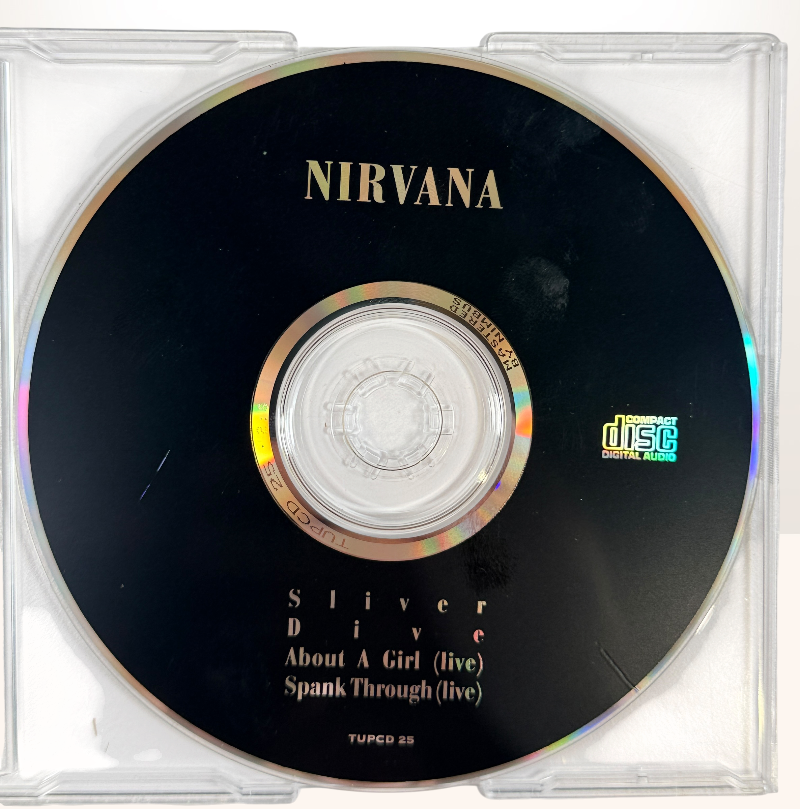 Original 1991 Nirvana Sliver UK CD Maxi Single on Tupelo Records (TUPCD 25). Tested and complete with artwork. Features Dive plus two live tracks.