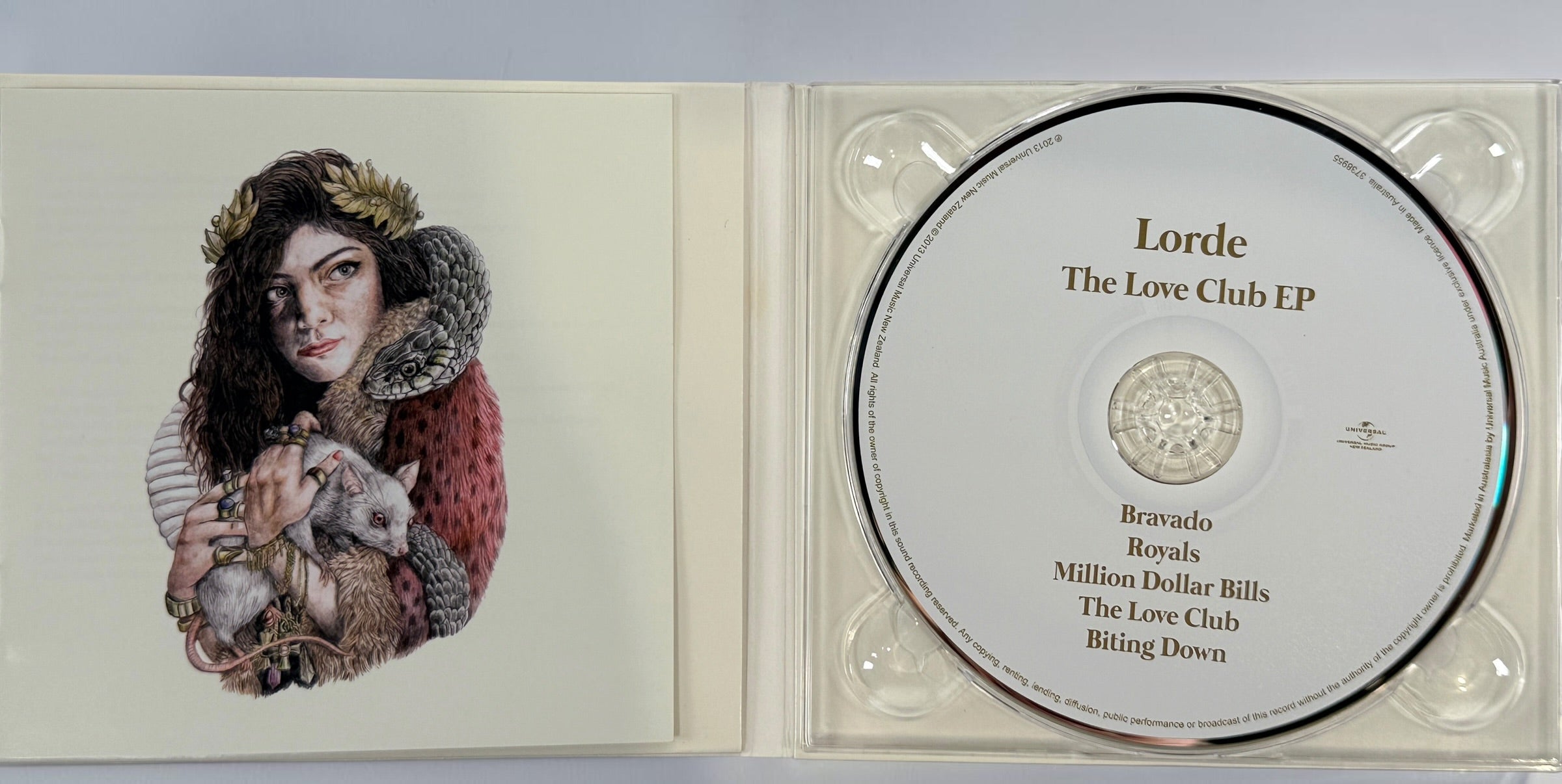 Official 2013 Australian pressing of Lorde’s&nbsp;The Love Club EP featuring the hit “Royals.” Complete, tested CD in original digipak, very good condition.