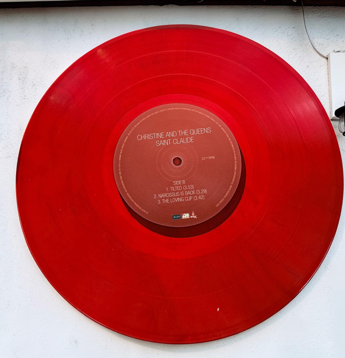 Rare 2015 Christine and the Queens Saint Claude EP on translucent red vinyl. Includes original sleeve and five-track 12-inch record in very good condition.