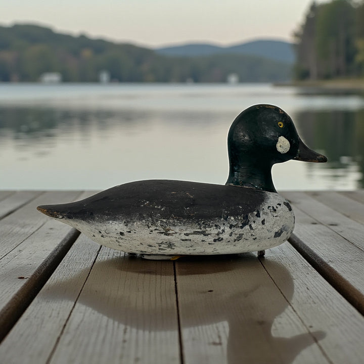 Vintage Quebec duck decoy attributed to Rivest of St-Sulpice. Hand-carved folk art with original ballast and authentic working wear. Collectible Canadian carving.