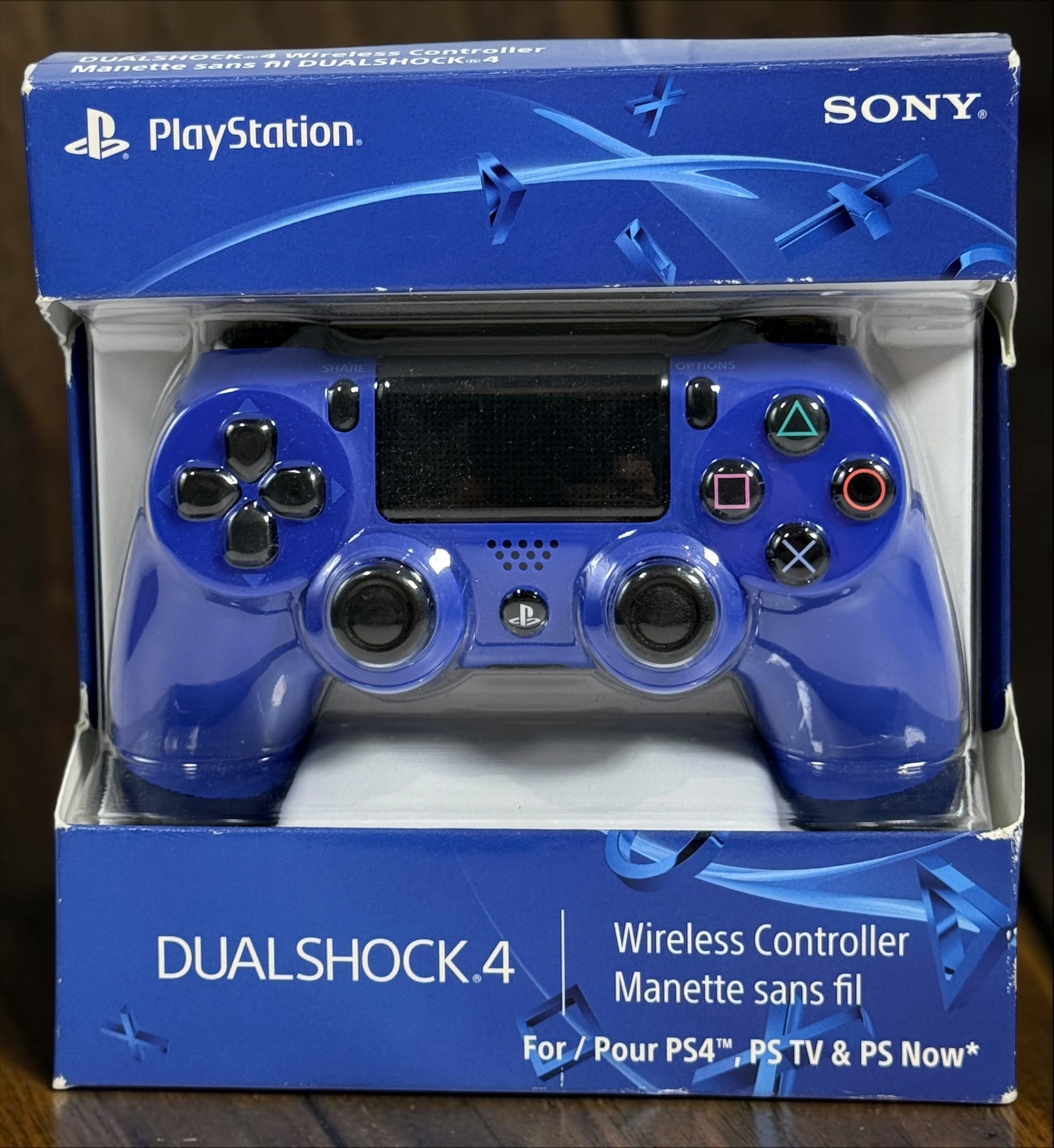 Authentic Sony DualShock 4 Wave Blue wireless controller for PS4. Complete in box with original packaging and manual. Tested OEM controller in excellent condition.