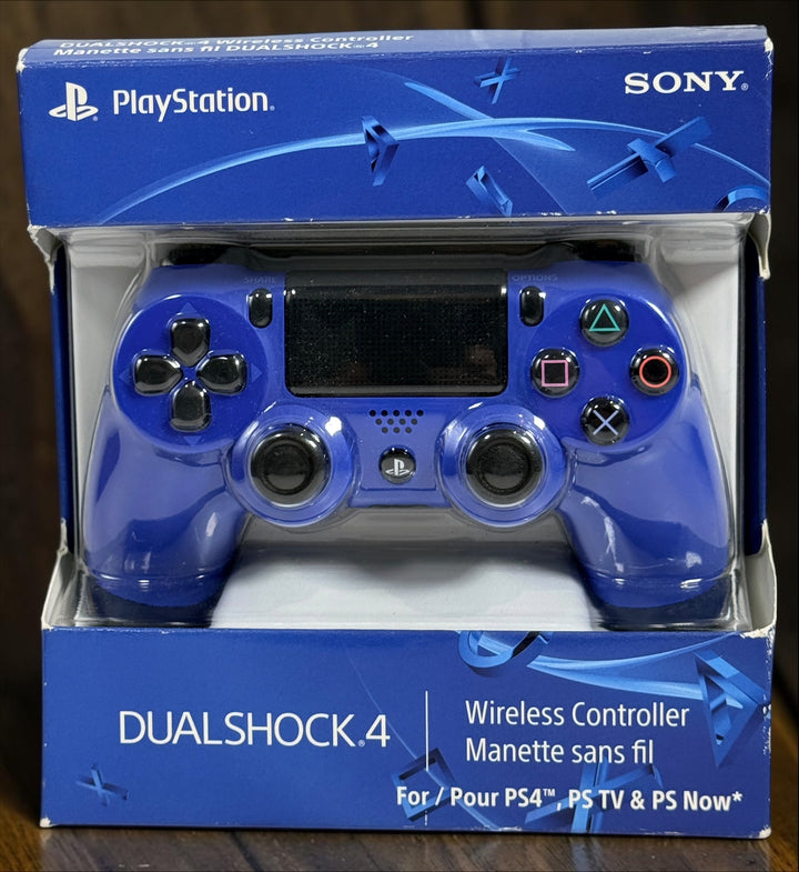 Authentic Sony DualShock 4 Wave Blue wireless controller for PS4. Complete in box with original packaging and manual. Tested OEM controller in excellent condition.