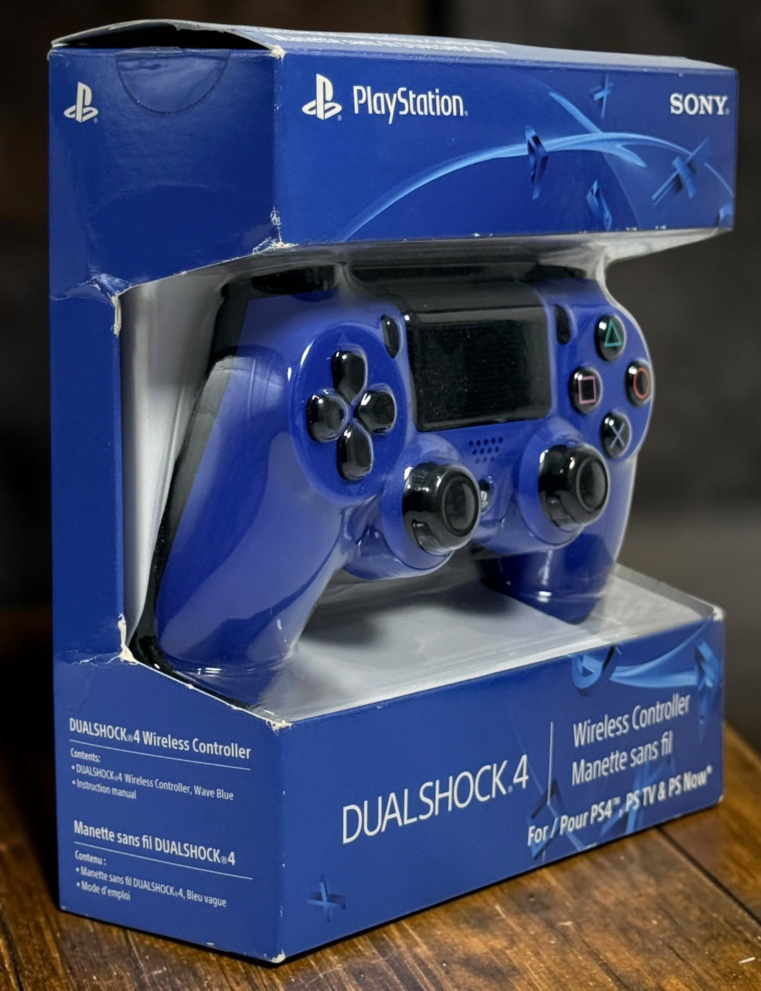 Authentic Sony DualShock 4 Wave Blue wireless controller for PS4. Complete in box with original packaging and manual. Tested OEM controller in excellent condition.