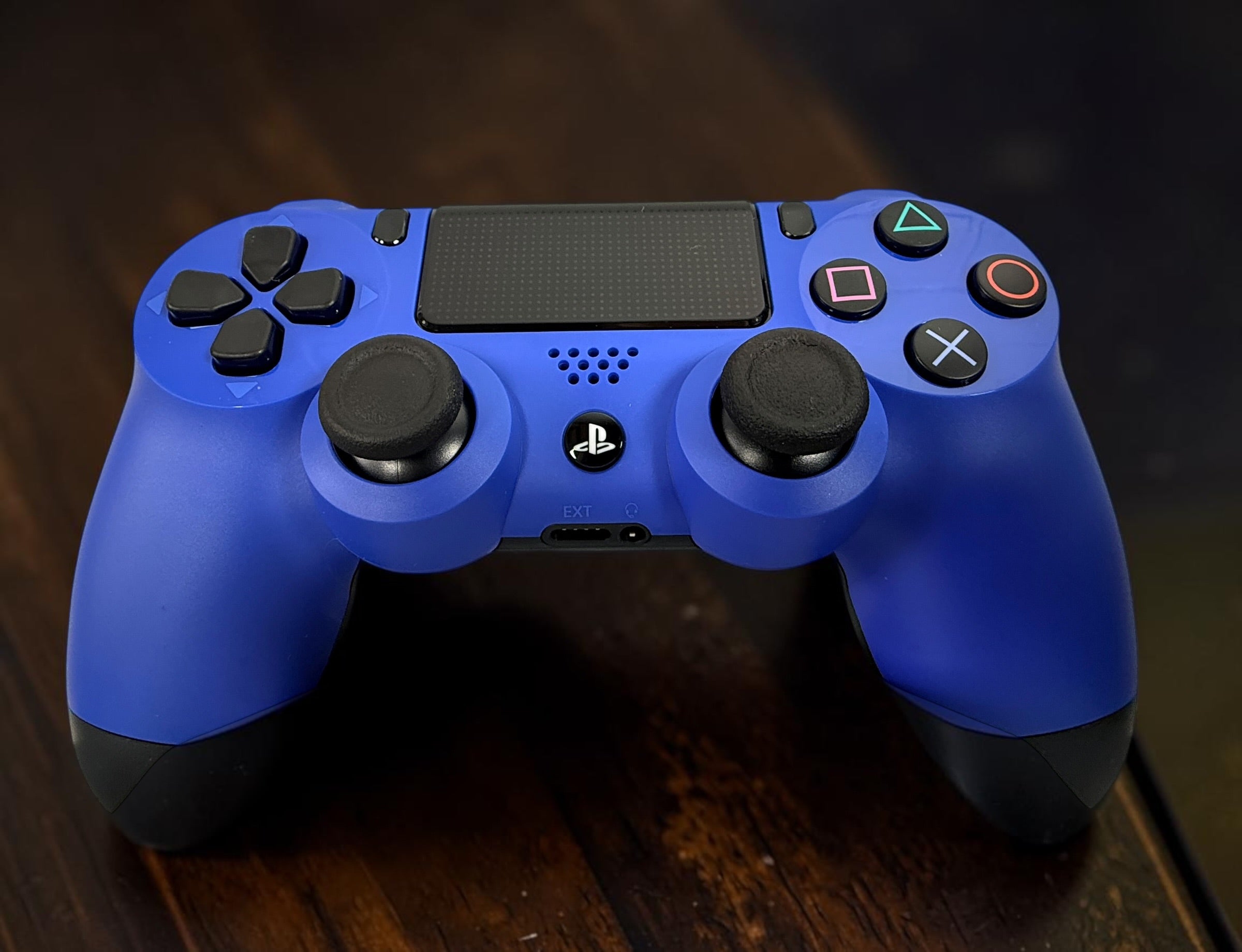 Authentic Sony DualShock 4 Wave Blue wireless controller for PS4. Complete in box with original packaging and manual. Tested OEM controller in excellent condition.