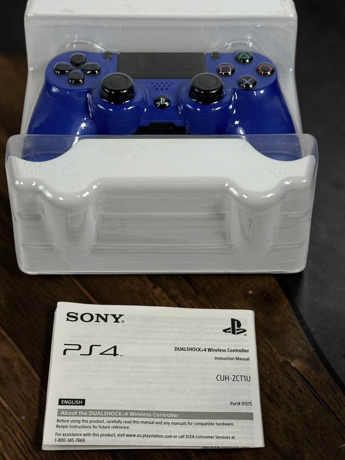 Authentic Sony DualShock 4 Wave Blue wireless controller for PS4. Complete in box with original packaging and manual. Tested OEM controller in excellent condition.