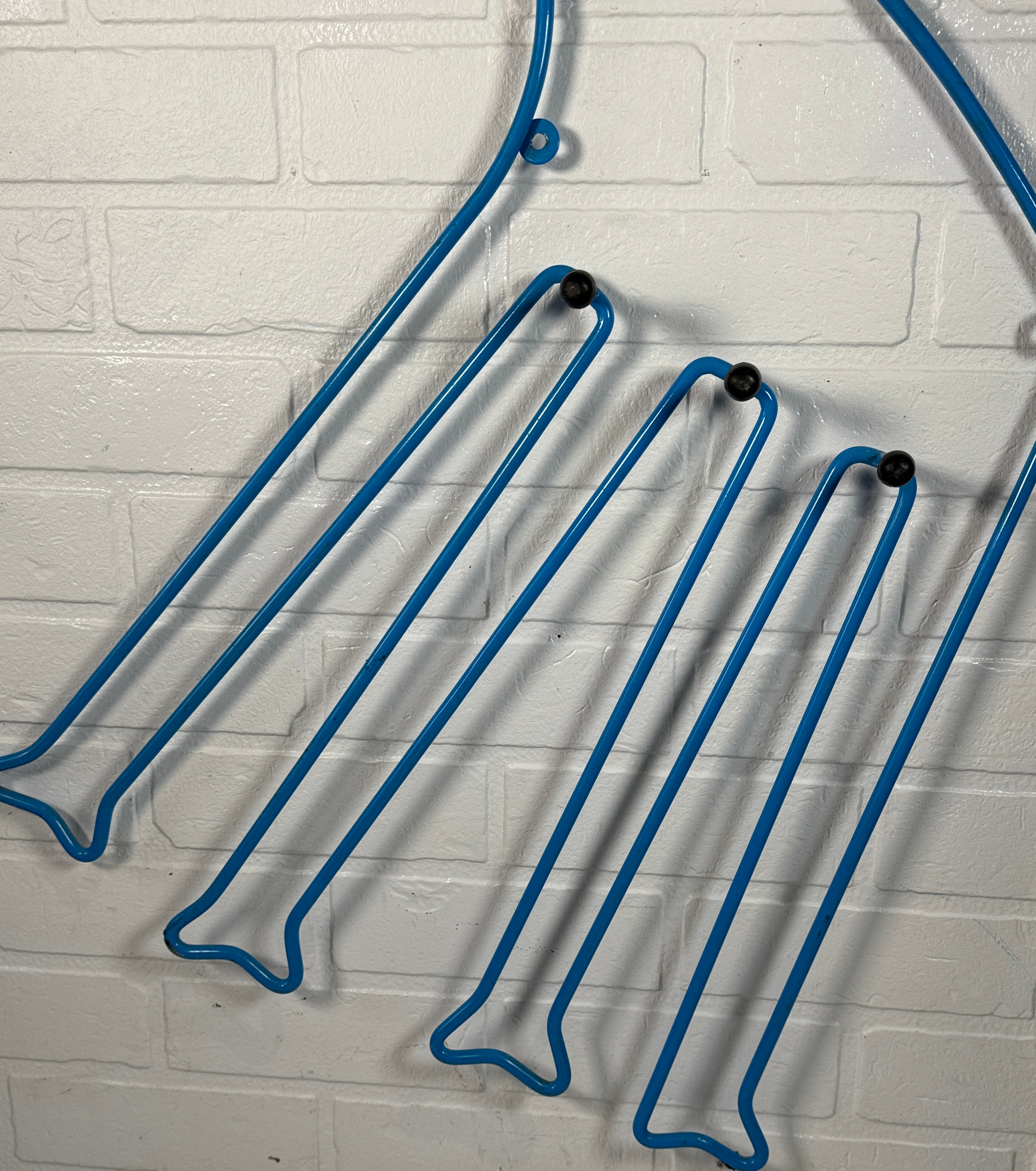 Vintage IKEA SPRALLIG blue metal giraffe wall coat rack from the 1990s. Fun décor piece, sturdy design, collectible. 