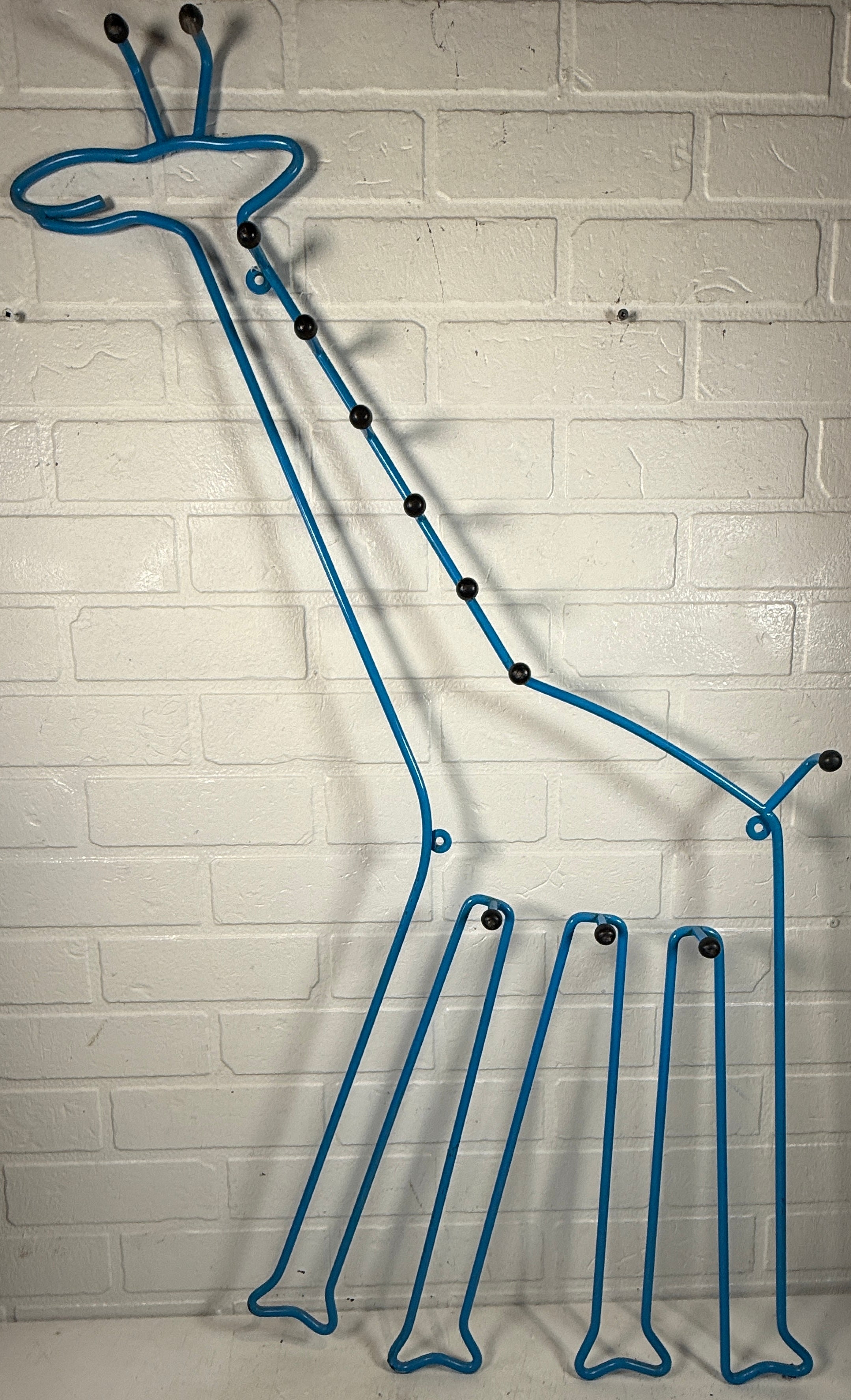Vintage IKEA SPRALLIG blue metal giraffe wall coat rack from the 1990s. Fun décor piece, sturdy design, collectible. Ships from Canada.