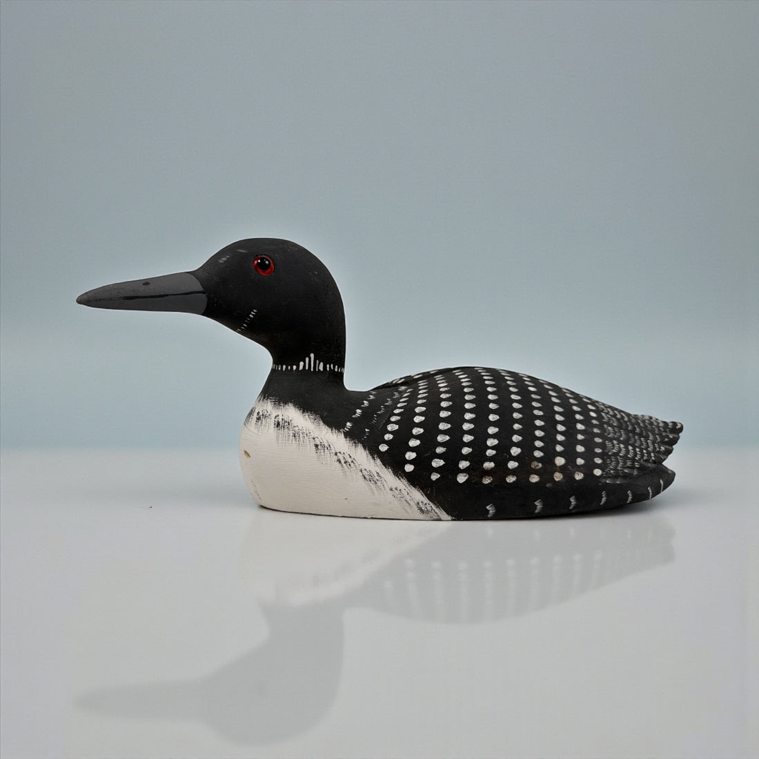 Large 14-inch Tremblay Canada hand-carved wooden loon. Vintage folk-art décor piece with original paint and maker’s stamp. Great display sculpture.