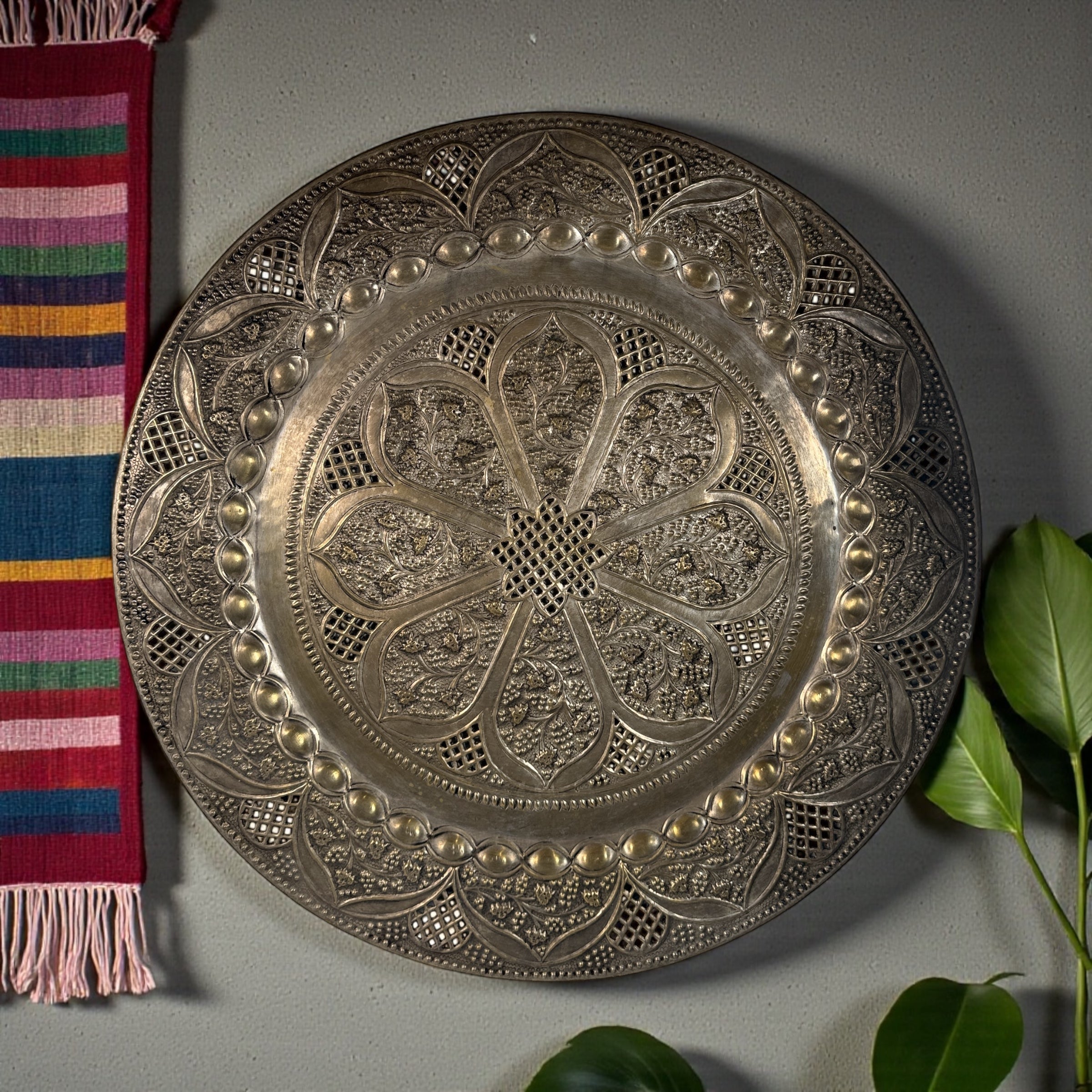 Vintage 24” solid brass tray made in India with hand-chased floral design and pierced edging. Ideal for décor or table use. Classic mid-century export piece.