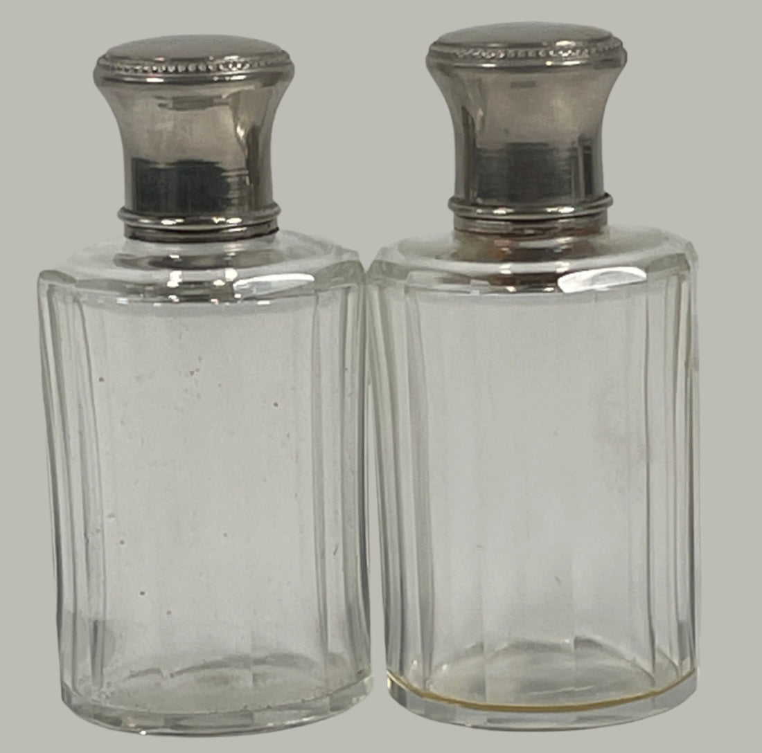 Pair of Vintage Ribbed Glass Vanity Bottles with Silver-Tone Screw Caps