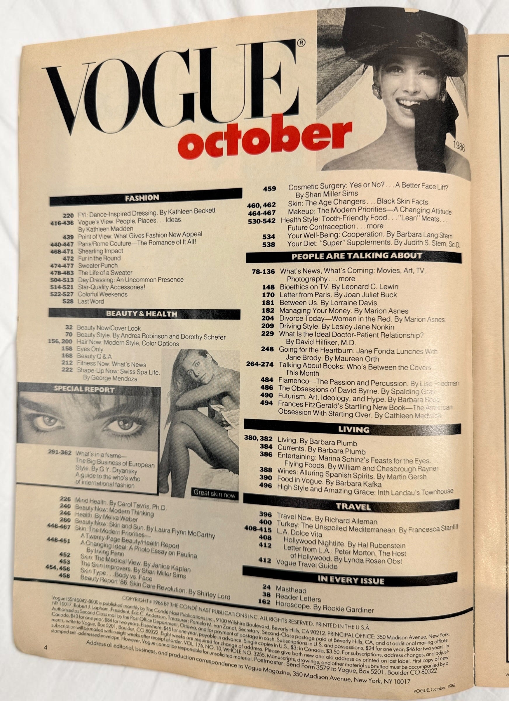 Vintage Vogue October 1986 featuring Cindy Crawford by Richard Avedon, with iconic 1980s fashion, supermodels and photography. Collector issue.
