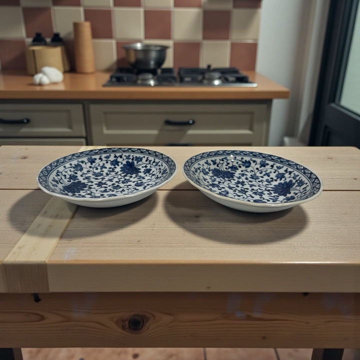 Vintage mid-century Arita blue and white porcelain bowls with scalloped rims and floral design. Elegant Japanese décor or serving pieces. Shop Eco Depot Montreal