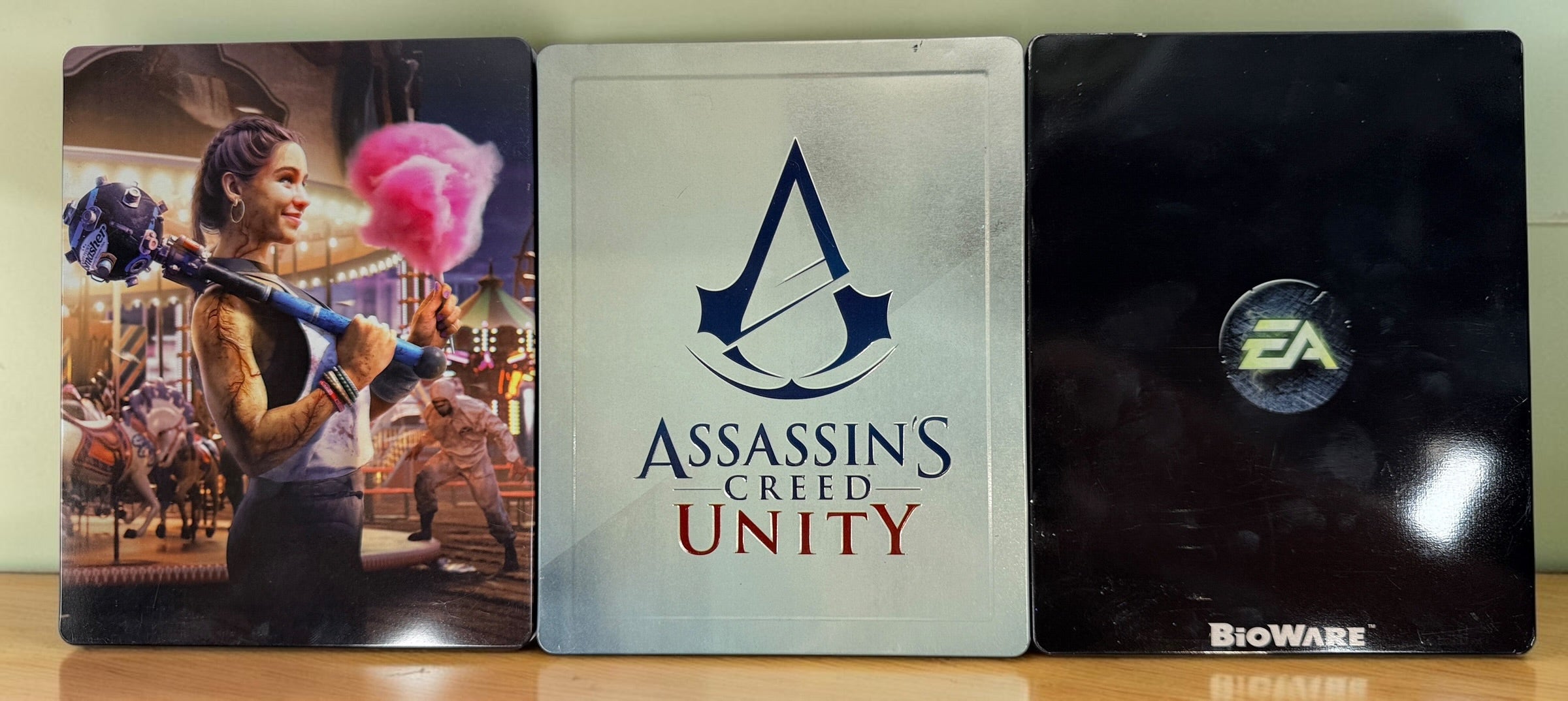 Lot of 3 collectible SteelBook cases: Assassin’s Creed Unity, Watch Dogs 2 and Dragon Age Inquisition. Empty cases only, no games included.