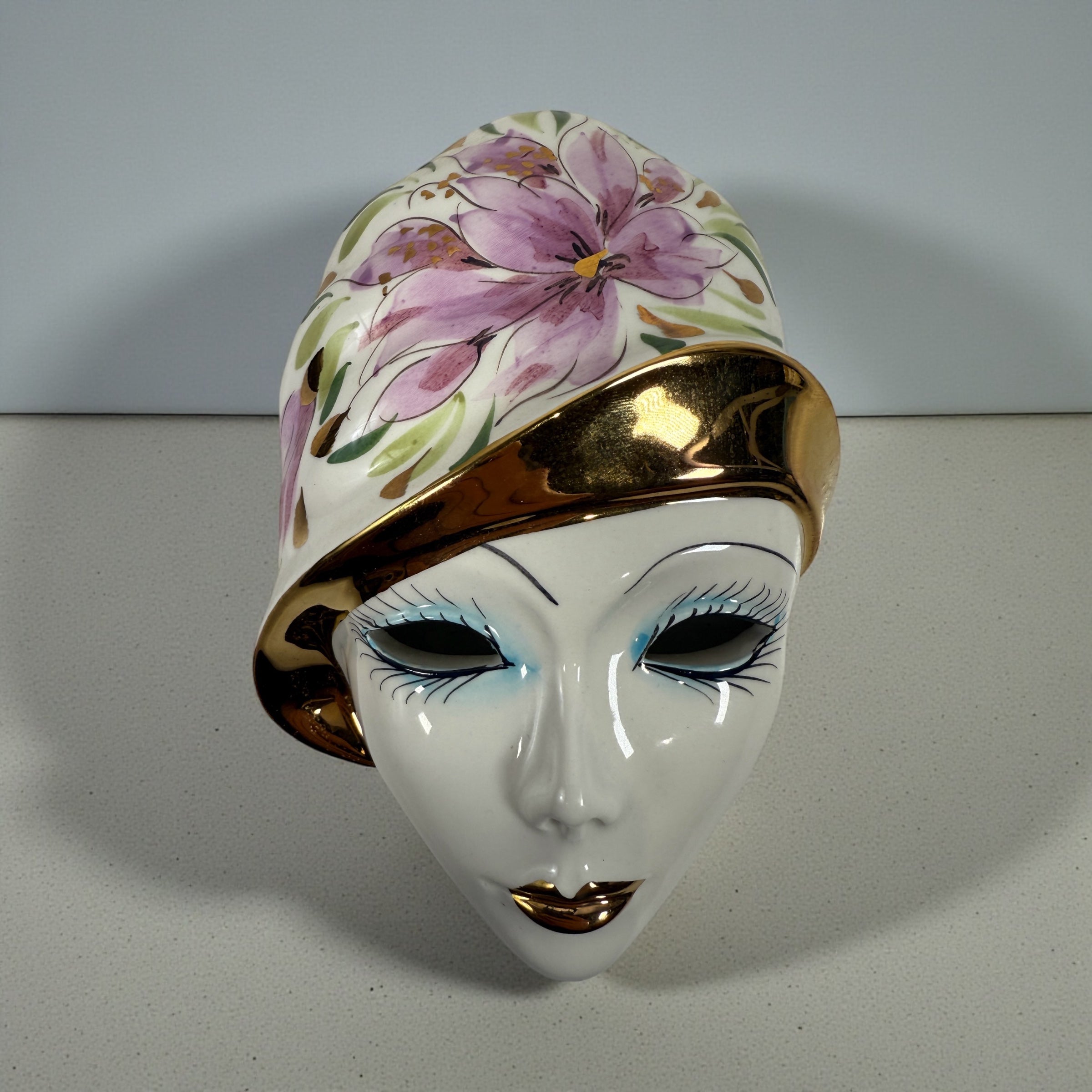 Vintage Italian Capodimonte porcelain wall mask with gold trim. Hand-painted decorative ceramic wall art made in Italy.