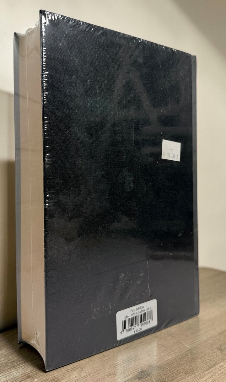 Harry Potter and the Deathly Hallows 2007 Bloomsbury Deluxe First Edition hardcover, factory sealed with gilt edges.