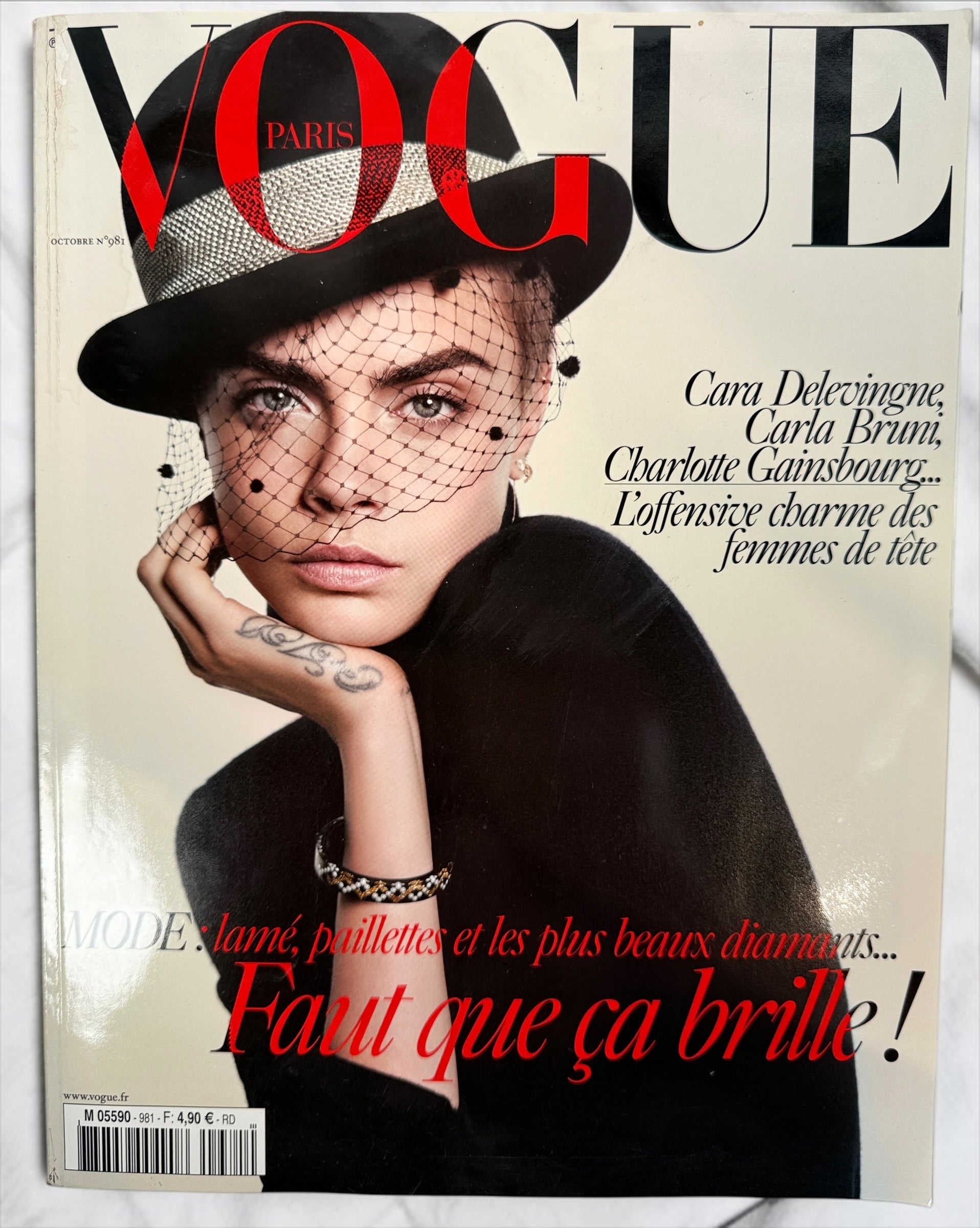 Vogue Paris October 2017 No. 981 featuring Cara Delevingne photographed by David Sims. Collectible French fashion magazine with editorials and luxury ads.
