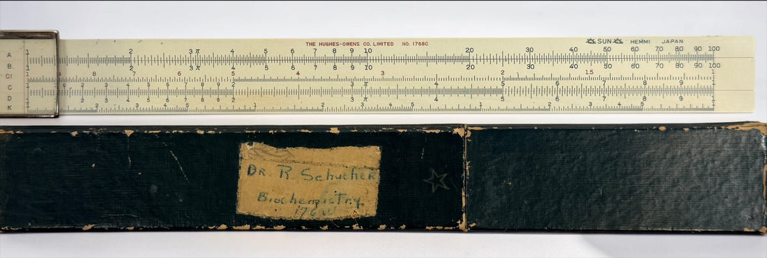 Vintage Hughes-Owens No. 1768C 10-inch slide rule made in Japan by Sun Hemmi. Mid-century bamboo engineering calculator with original case.