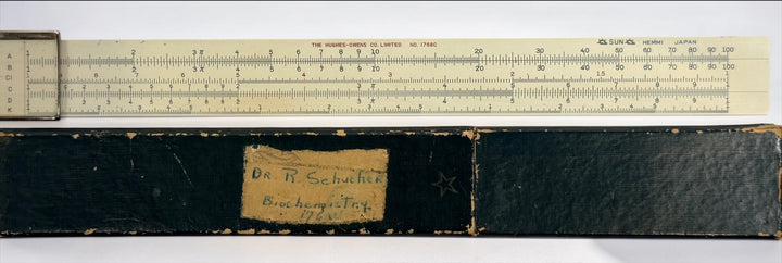Vintage Hughes-Owens No. 1768C 10-inch slide rule made in Japan by Sun Hemmi. Mid-century bamboo engineering calculator with original case.