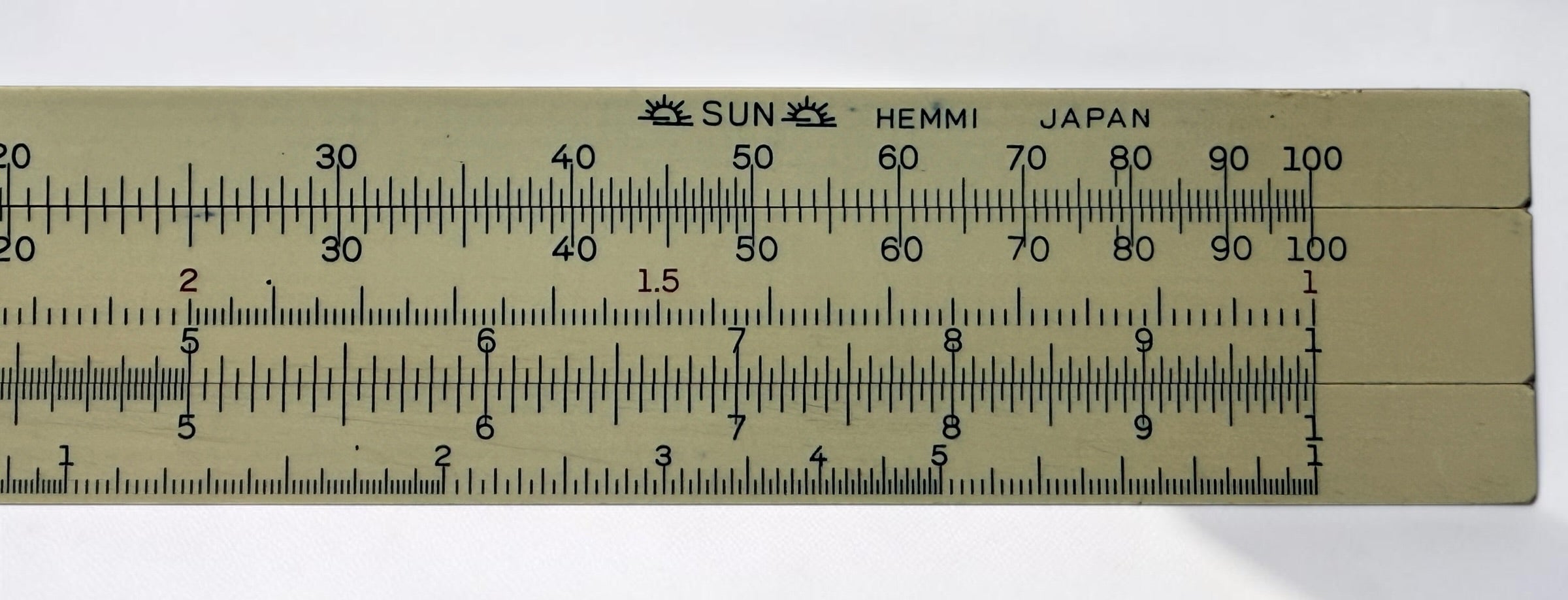 Vintage Hughes-Owens No. 1768C 10-inch slide rule made in Japan by Sun Hemmi. Mid-century bamboo engineering calculator with original case.