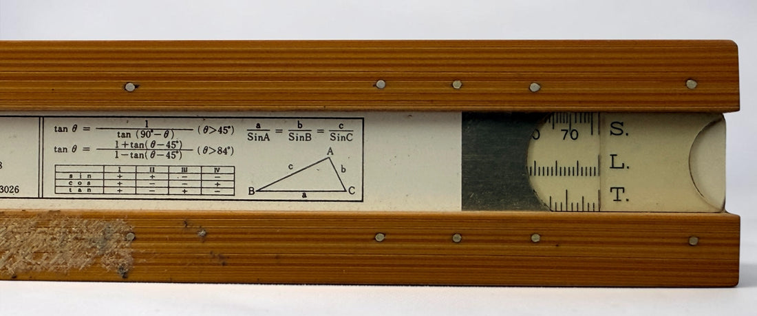 Vintage Hughes-Owens No. 1768C 10-inch slide rule made in Japan by Sun Hemmi. Mid-century bamboo engineering calculator with original case.