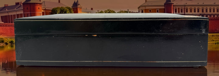Vintage Russian lacquer decorative box featuring a historic Moscow Kremlin scene, black lacquer exterior and striking red interio