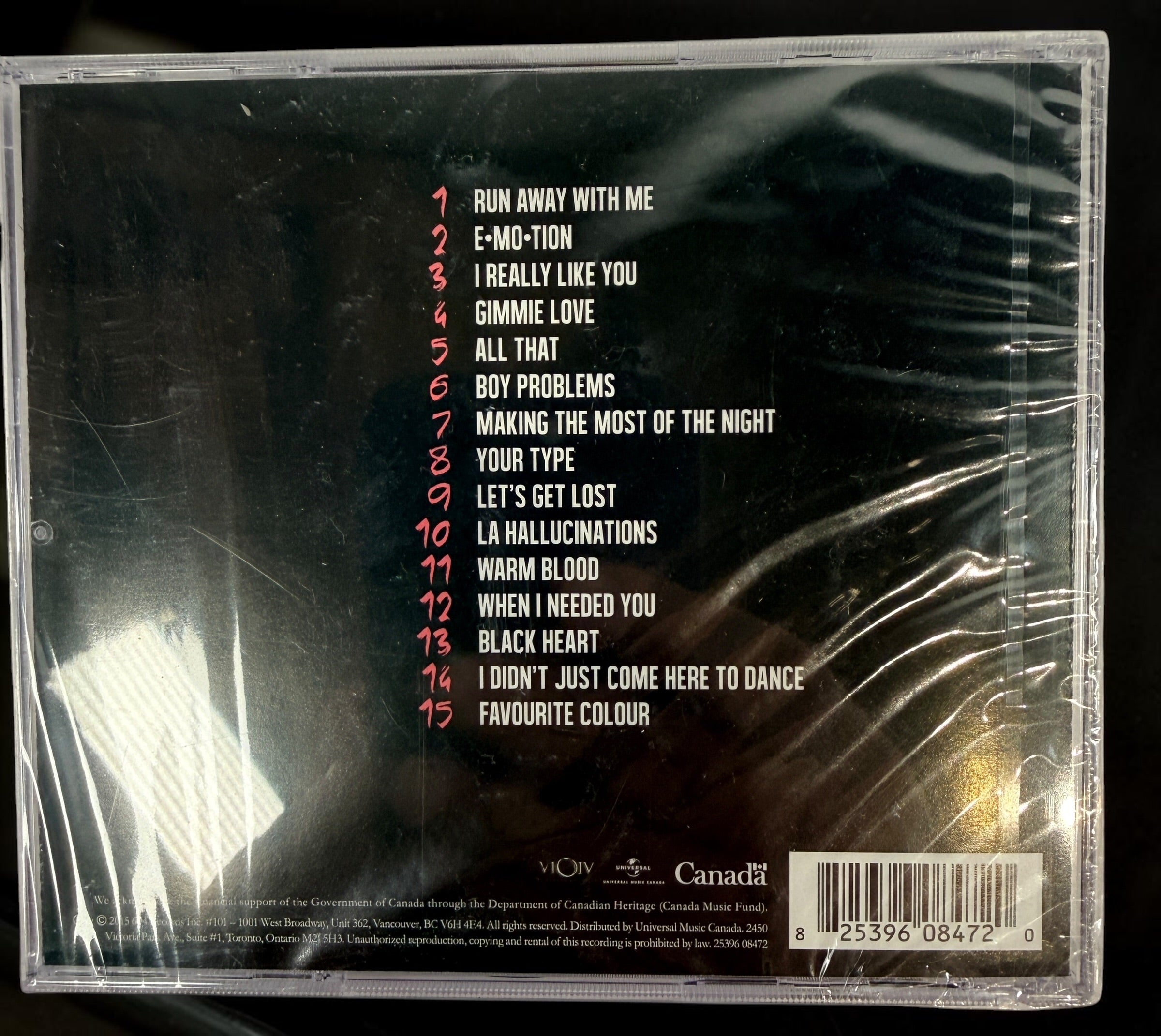 Factory-sealed Carly Rae Jepsen E•MO•TION CD (2015). Original Canadian release with HMV sticker, featuring “Run Away With Me” and “I Really Like You.”