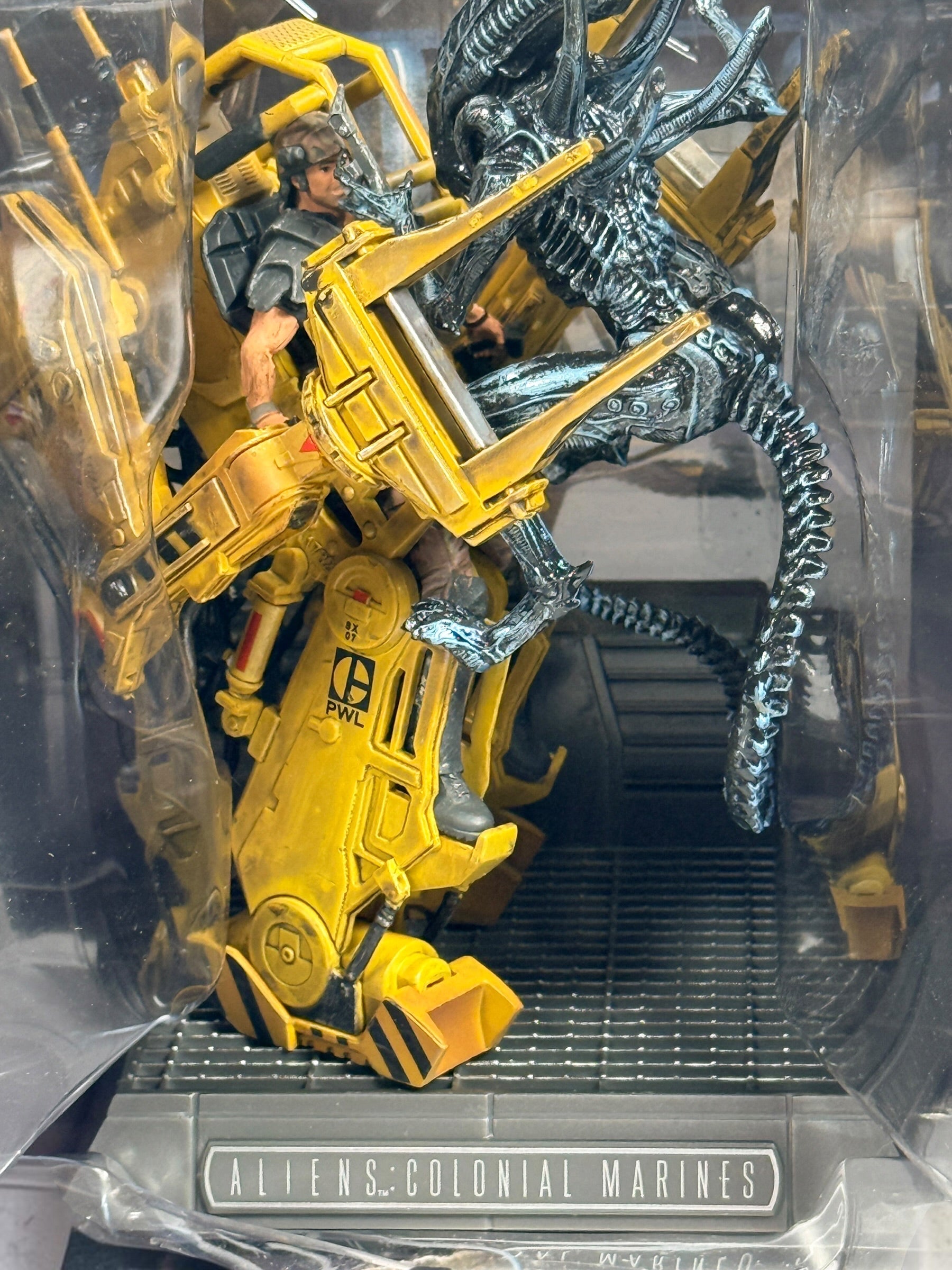 Aliens Colonial Marines Collector’s Edition for PS3 with Power Loader vs. Xenomorph statue, sealed USCM patches and original packaging. Water-damaged box.