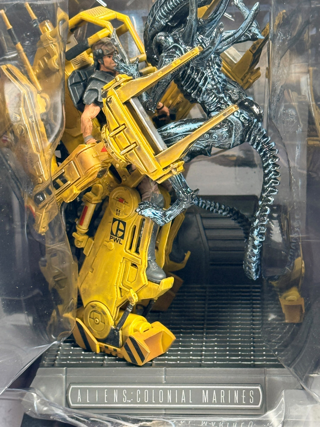 Aliens Colonial Marines Collector’s Edition for PS3 with Power Loader vs. Xenomorph statue, sealed USCM patches and original packaging. Water-damaged box.