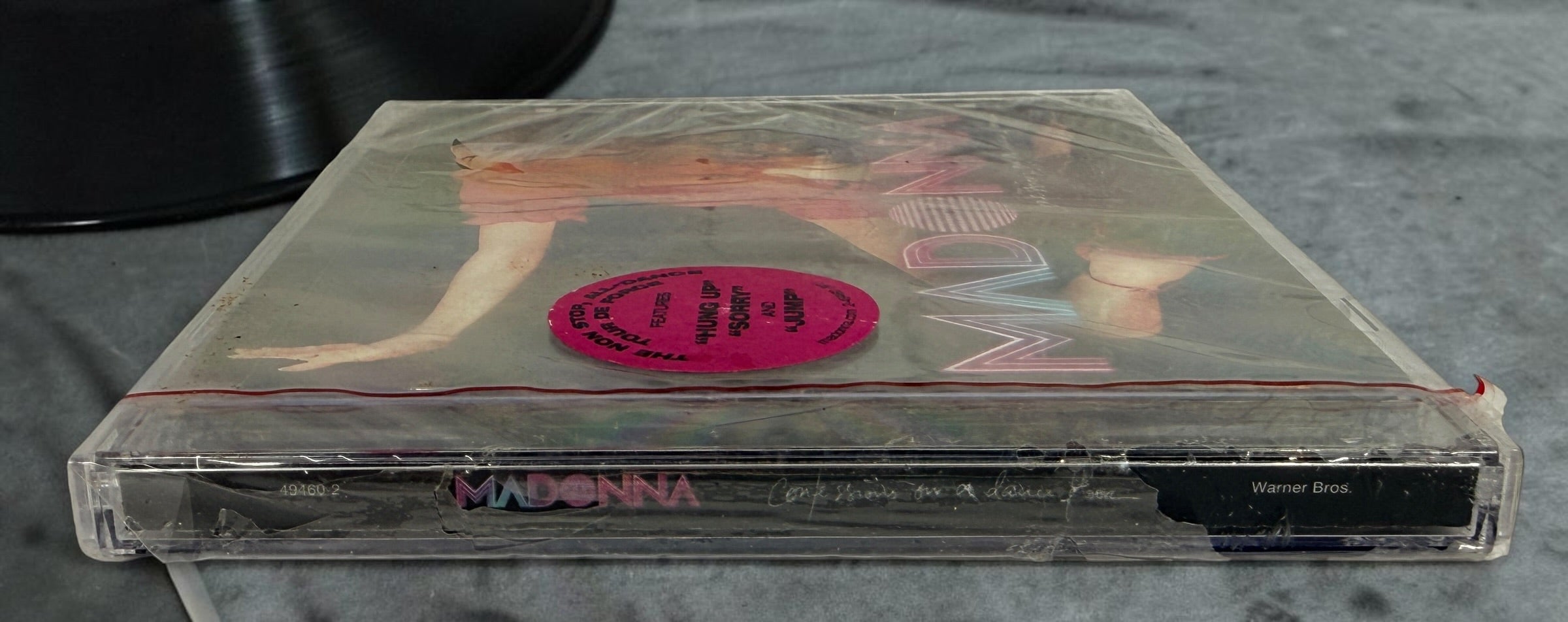 Factory-sealed 2005 Madonna Confessions on a Dance Floor CD featuring “Hung Up,” “Sorry,” and “Jump.” Original Warner Bros. release with hype sticker.