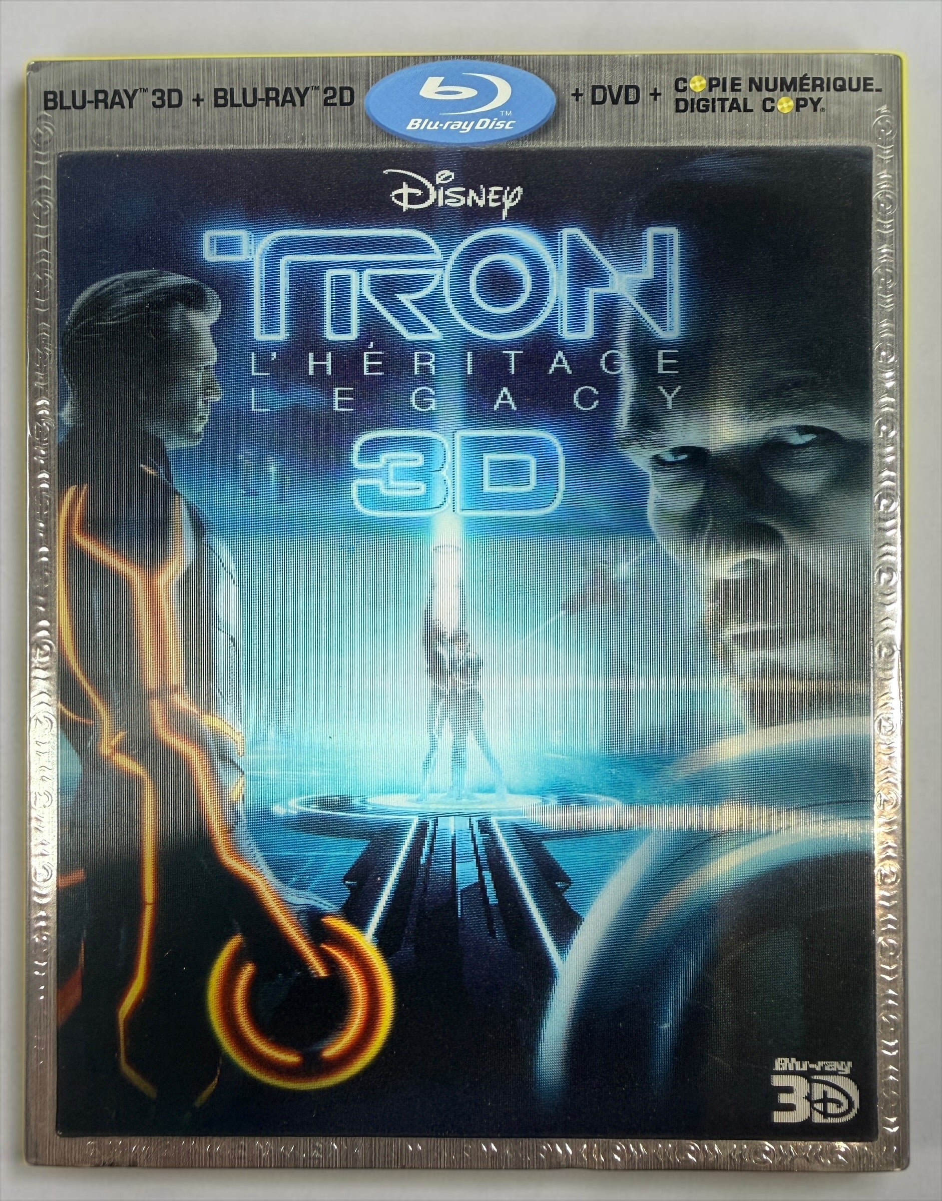 Complete Disney TRON: Legacy 4-disc combo pack with Blu-ray 3D, Blu-ray, DVD, digital copy disc, original case and embossed slipcover. Tested and complete.