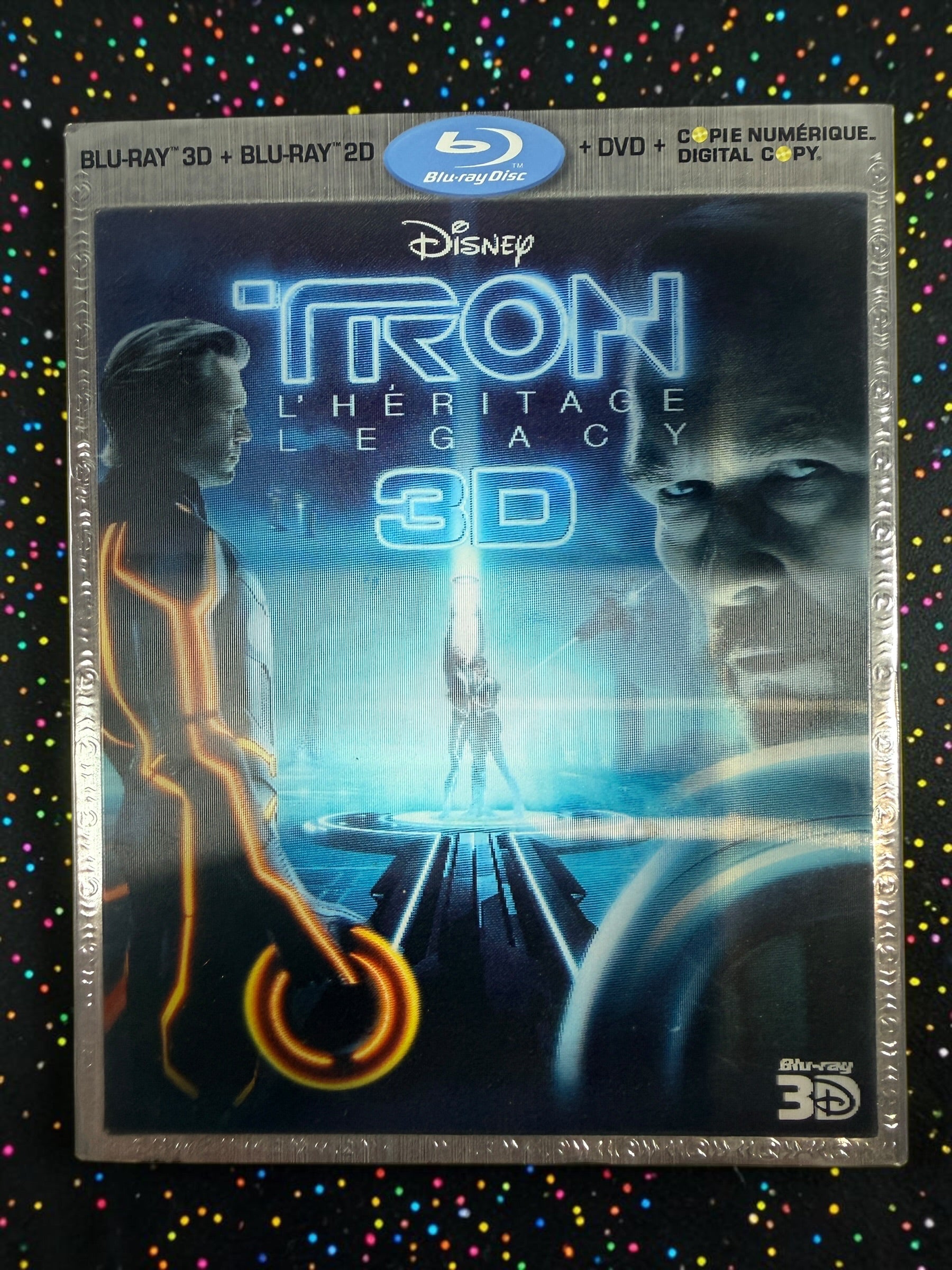 Complete Disney TRON: Legacy 4-disc combo pack with Blu-ray 3D, Blu-ray, DVD, digital copy disc, original case and embossed slipcover. Tested and complete.