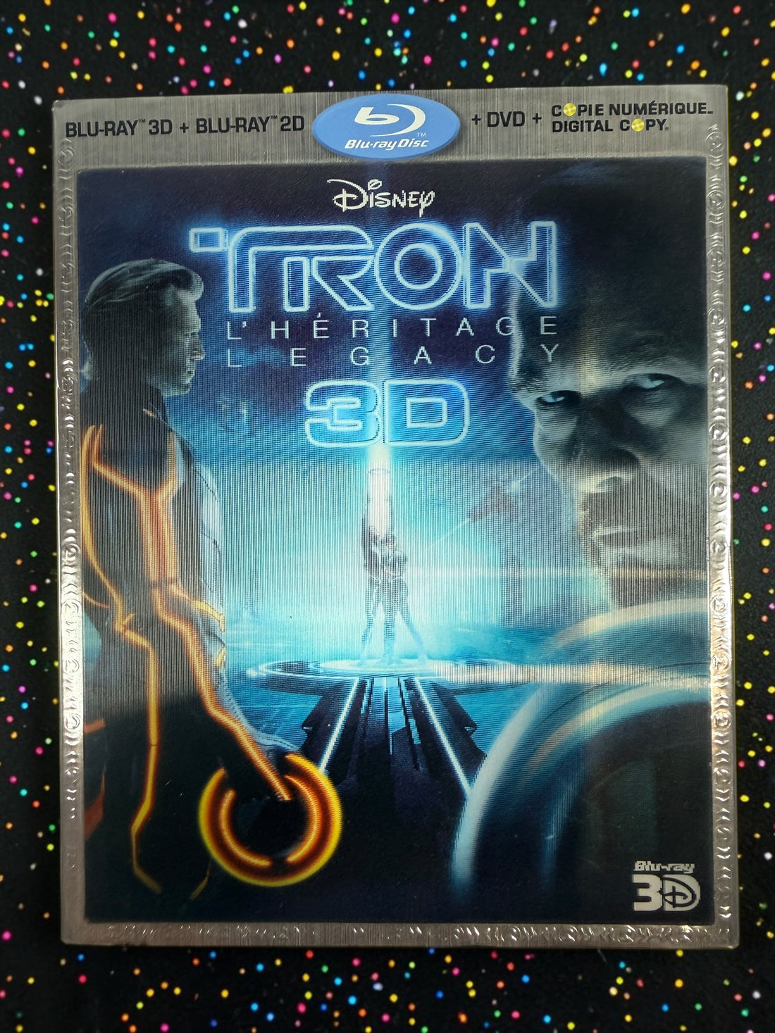 Complete Disney TRON: Legacy 4-disc combo pack with Blu-ray 3D, Blu-ray, DVD, digital copy disc, original case and embossed slipcover. Tested and complete.