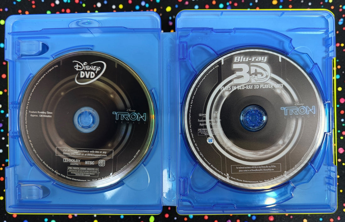 Complete Disney TRON: Legacy 4-disc combo pack with Blu-ray 3D, Blu-ray, DVD, digital copy disc, original case and embossed slipcover. Tested and complete.