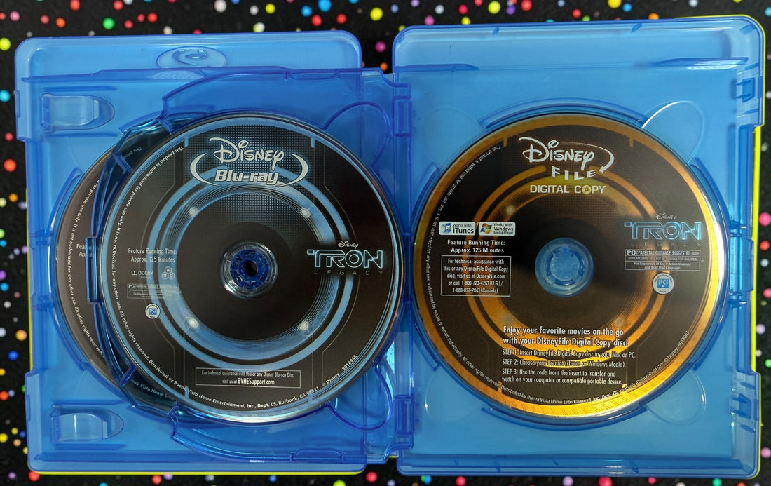 Complete Disney TRON: Legacy 4-disc combo pack with Blu-ray 3D, Blu-ray, DVD, digital copy disc, original case and embossed slipcover. Tested and complete.