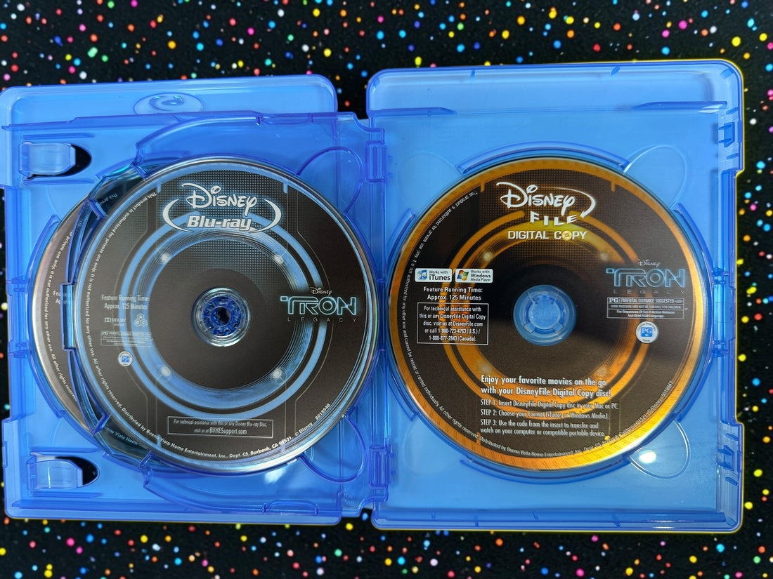 Complete Disney TRON: Legacy 4-disc combo pack with Blu-ray 3D, Blu-ray, DVD, digital copy disc, original case and embossed slipcover. Tested and complete.