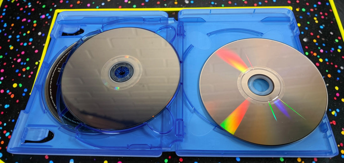 Complete Disney TRON: Legacy 4-disc combo pack with Blu-ray 3D, Blu-ray, DVD, digital copy disc, original case and embossed slipcover. Tested and complete.