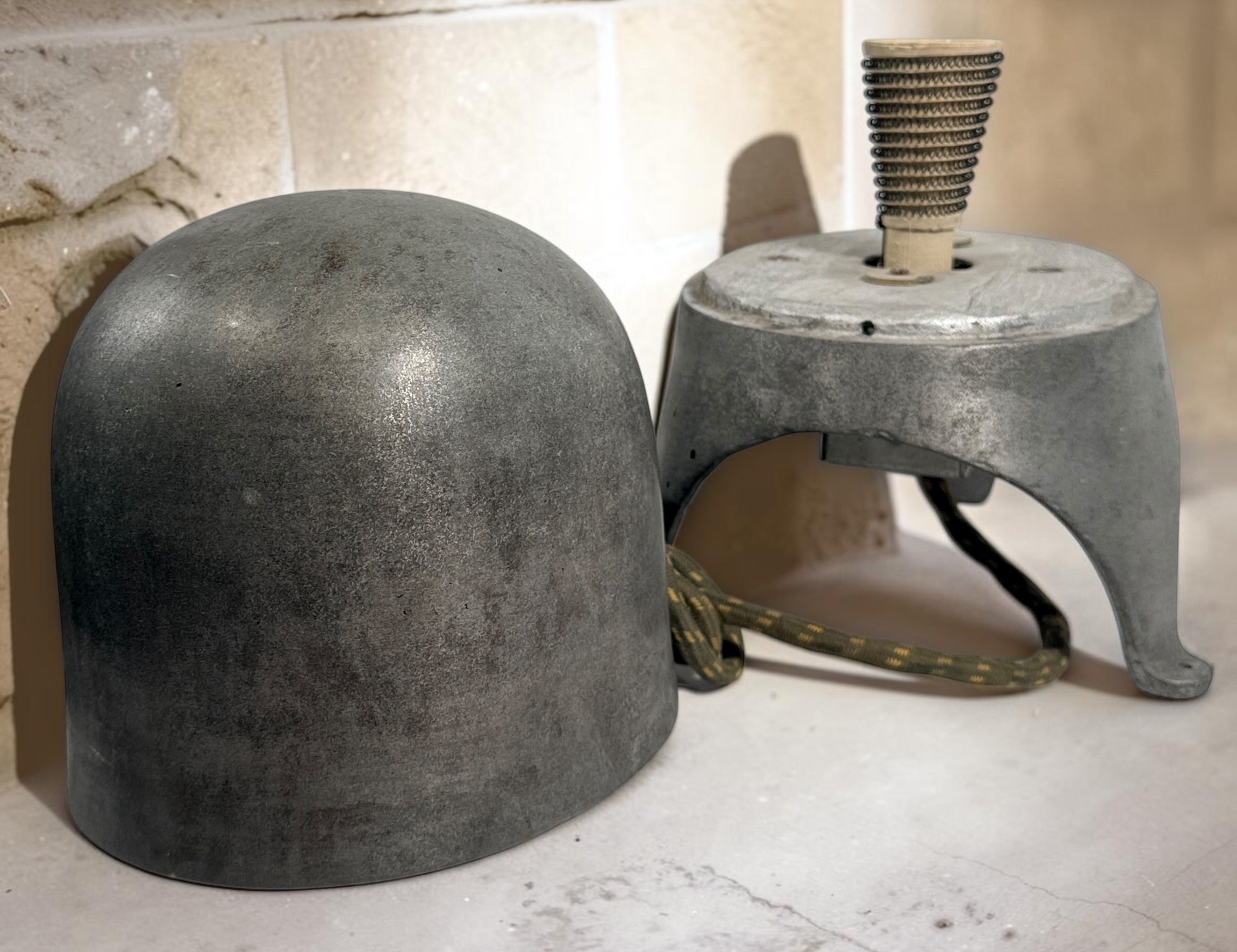 Working antique electric millinery hat block heater with cast aluminum housing and original ceramic heating element. Rare professional hat making equipment from the mid-20th century.