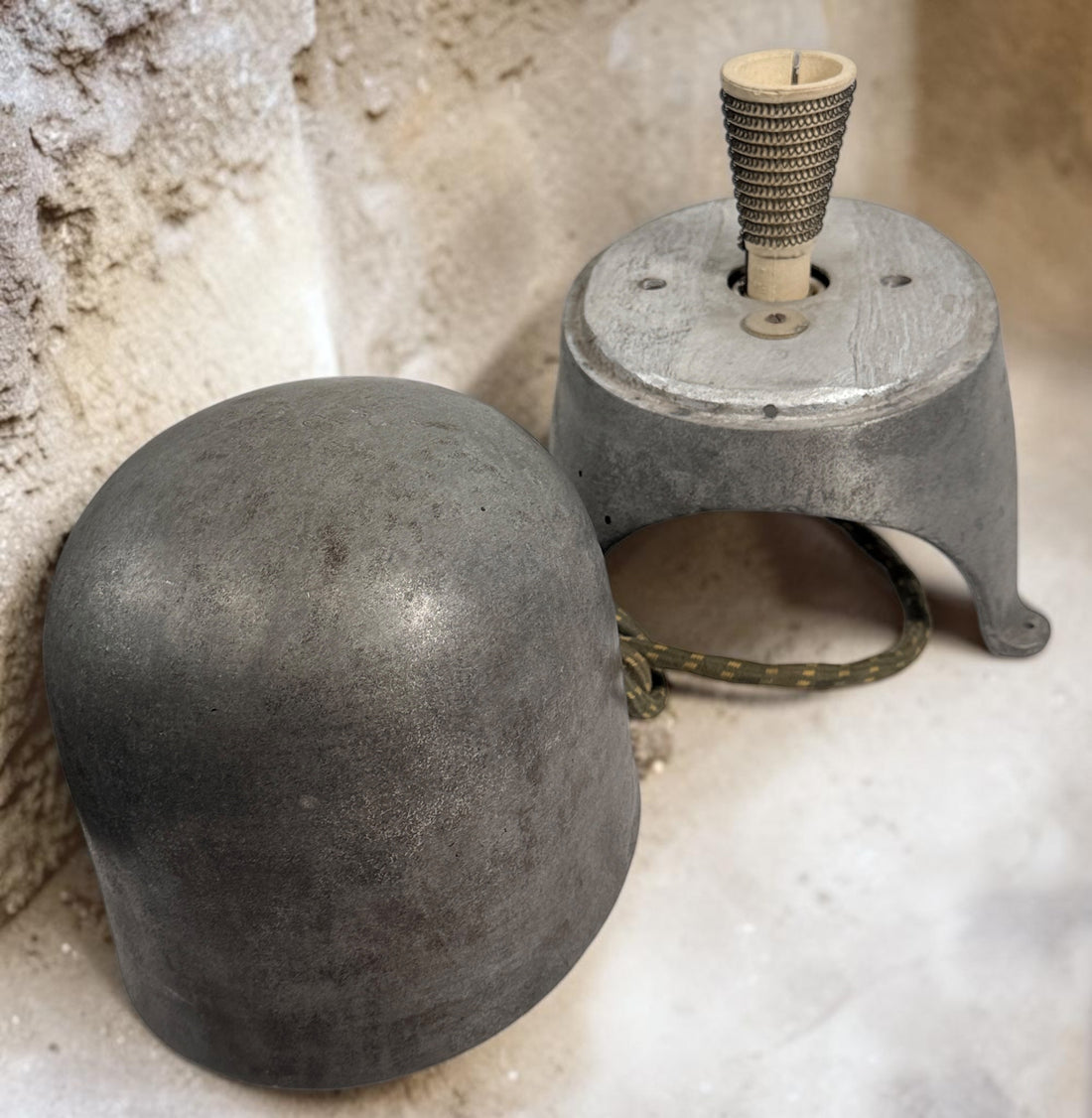 Working antique electric millinery hat block heater with cast aluminum housing and original ceramic heating element. Rare professional hat making equipment from the mid-20th century.