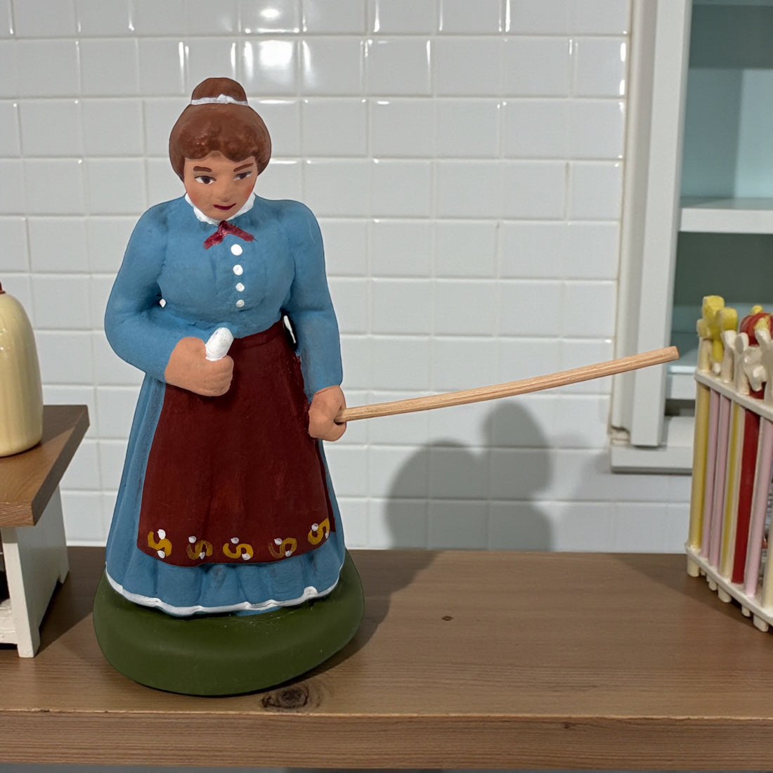 Mid-century French Aubagne pottery figurine by N. Dilandro. Handmade Provençal faience village woman, 1950s French folk art décor.