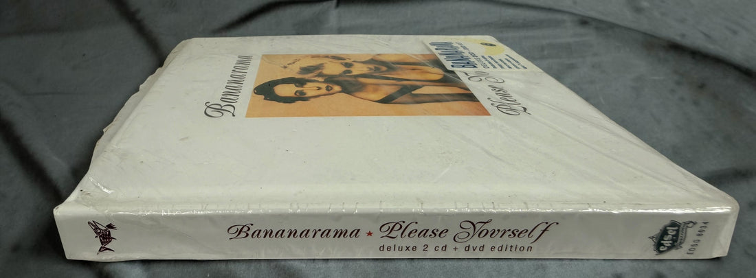 Factory-sealed Bananarama Please Yourself Deluxe Edition featuring 2 CDs, DVD, rare remixes, promo videos and a 28-page booklet. 2013 Edsel release.