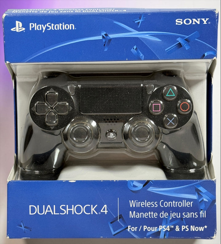 Genuine Sony DualShock 4 V2 wireless PS4 controller complete with original box and inner tray. Tested, fully functional, and ready to play.