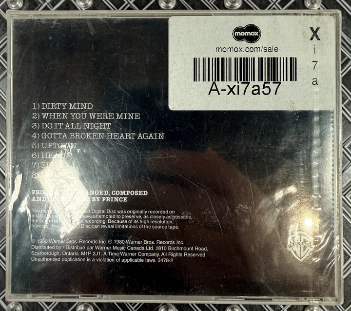 Factory-sealed Canadian pressing of Prince’s Dirty Mind CD on Warner Bros. Features “When You Were Mine,” “Uptown,” and other classic tracks.