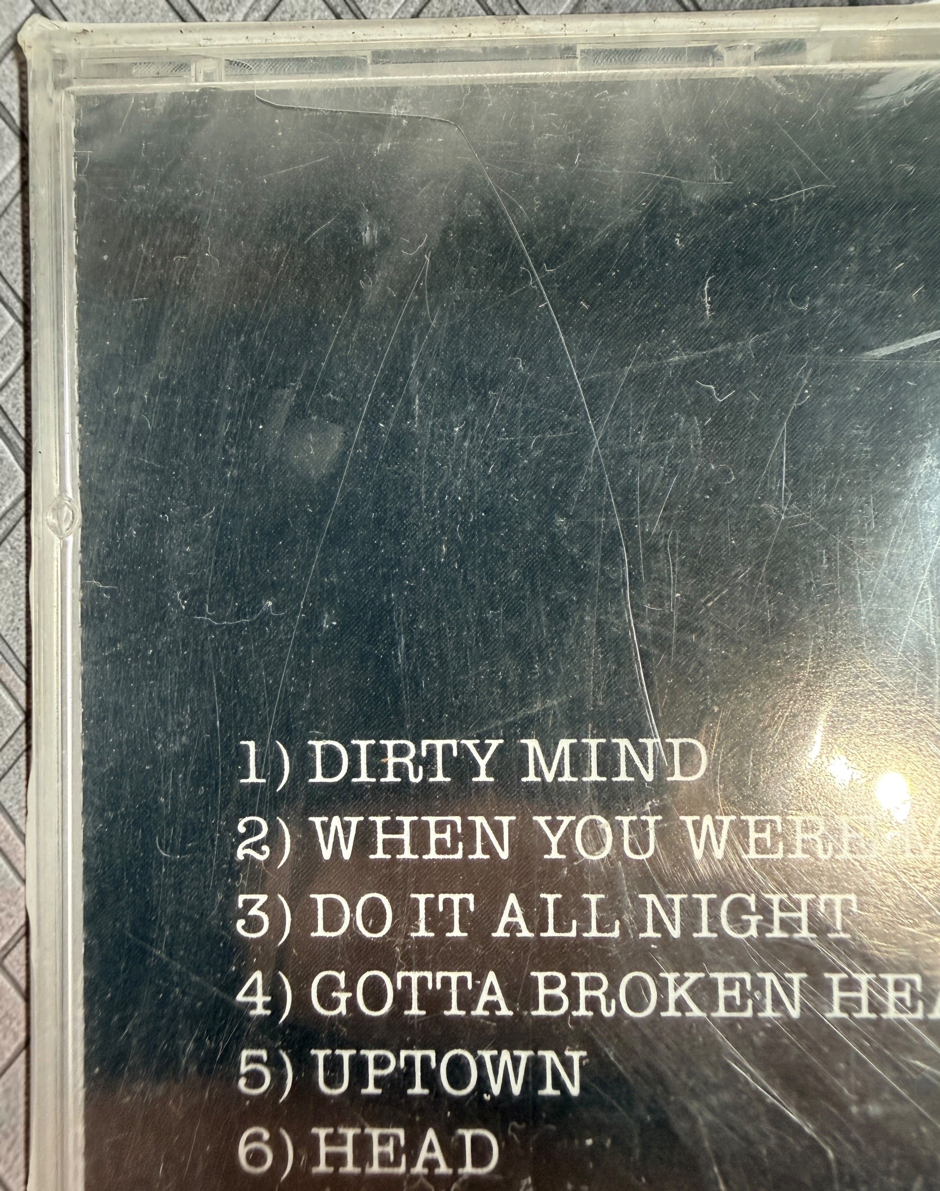 Factory-sealed Canadian pressing of Prince’s Dirty Mind CD on Warner Bros. Features “When You Were Mine,” “Uptown,” and other classic tracks.
