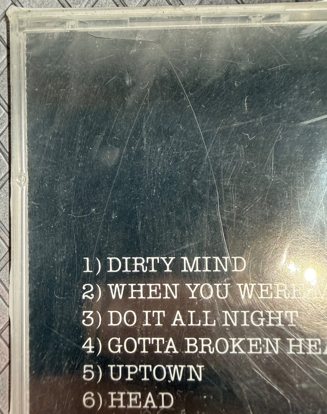 Factory-sealed Canadian pressing of Prince’s Dirty Mind CD on Warner Bros. Features “When You Were Mine,” “Uptown,” and other classic tracks.