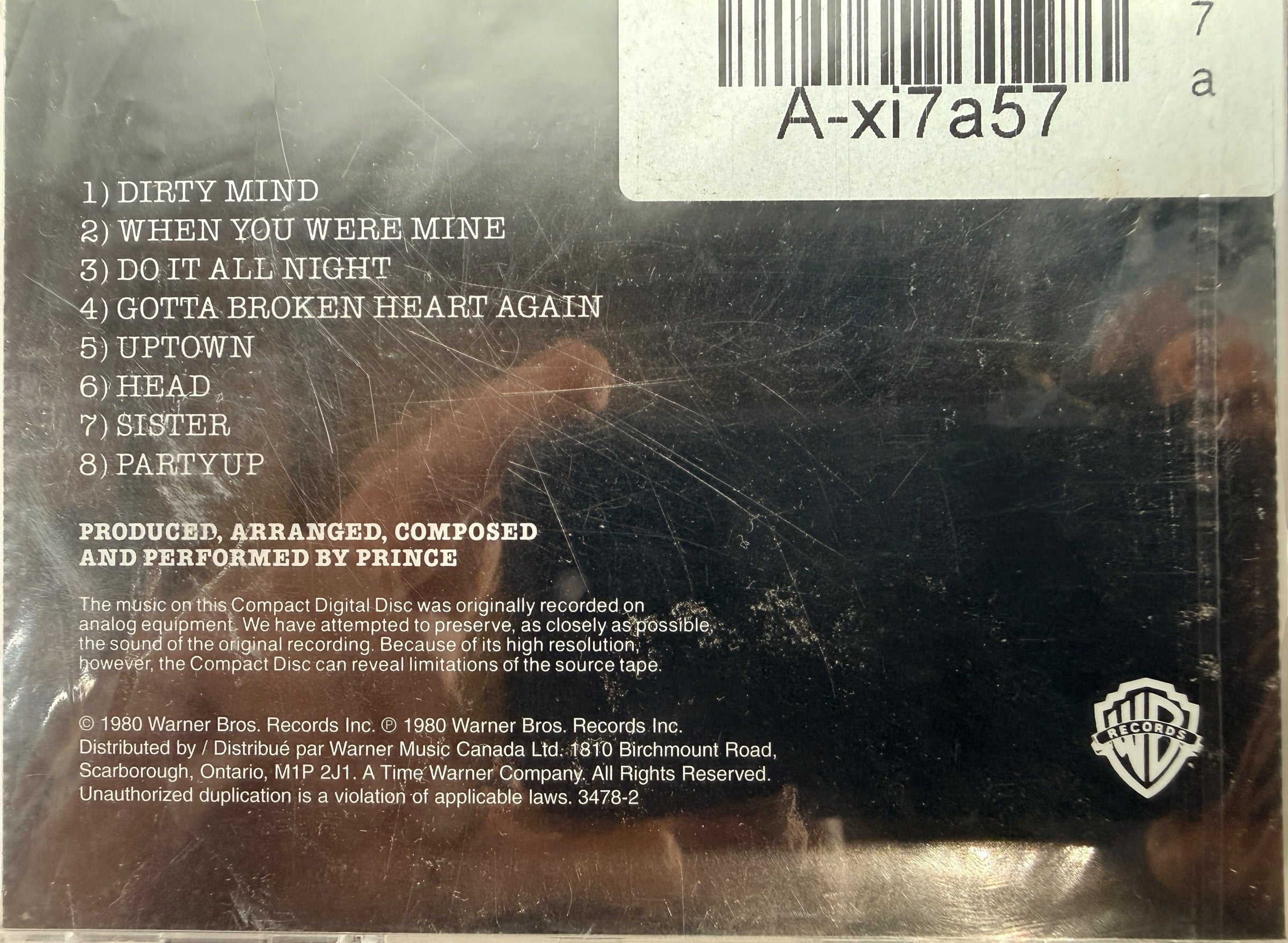 Factory-sealed Canadian pressing of Prince’s Dirty Mind CD on Warner Bros. Features “When You Were Mine,” “Uptown,” and other classic tracks.